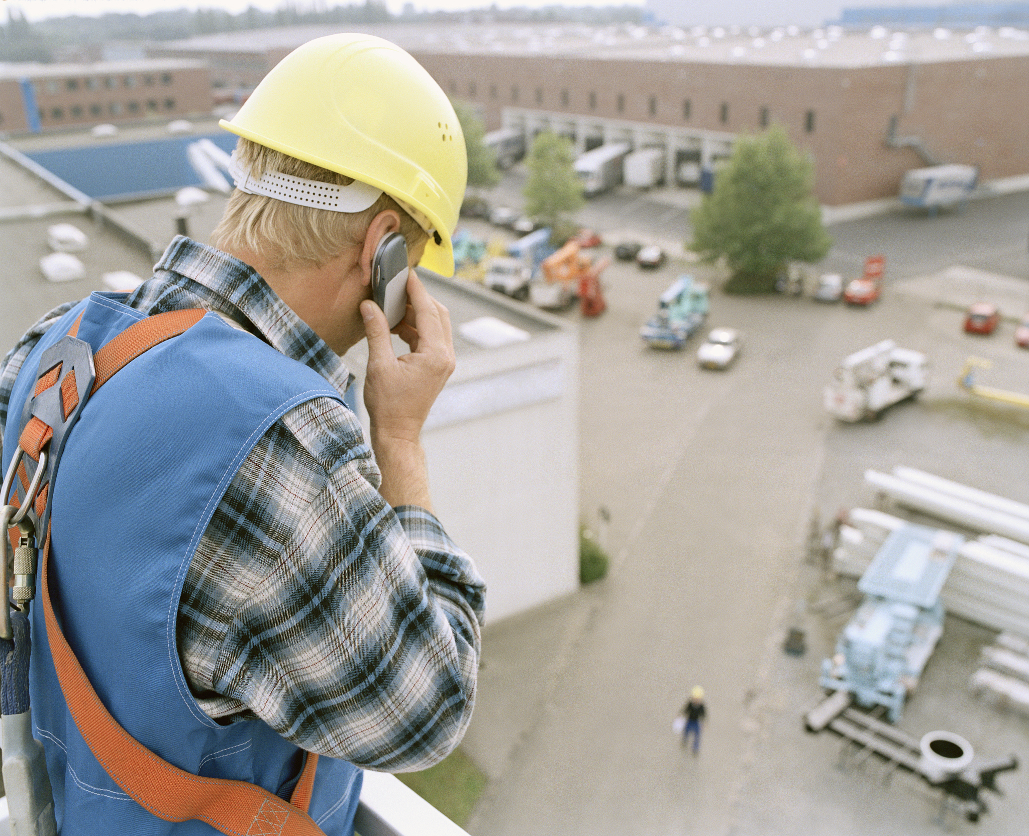 construction worker on cell phone