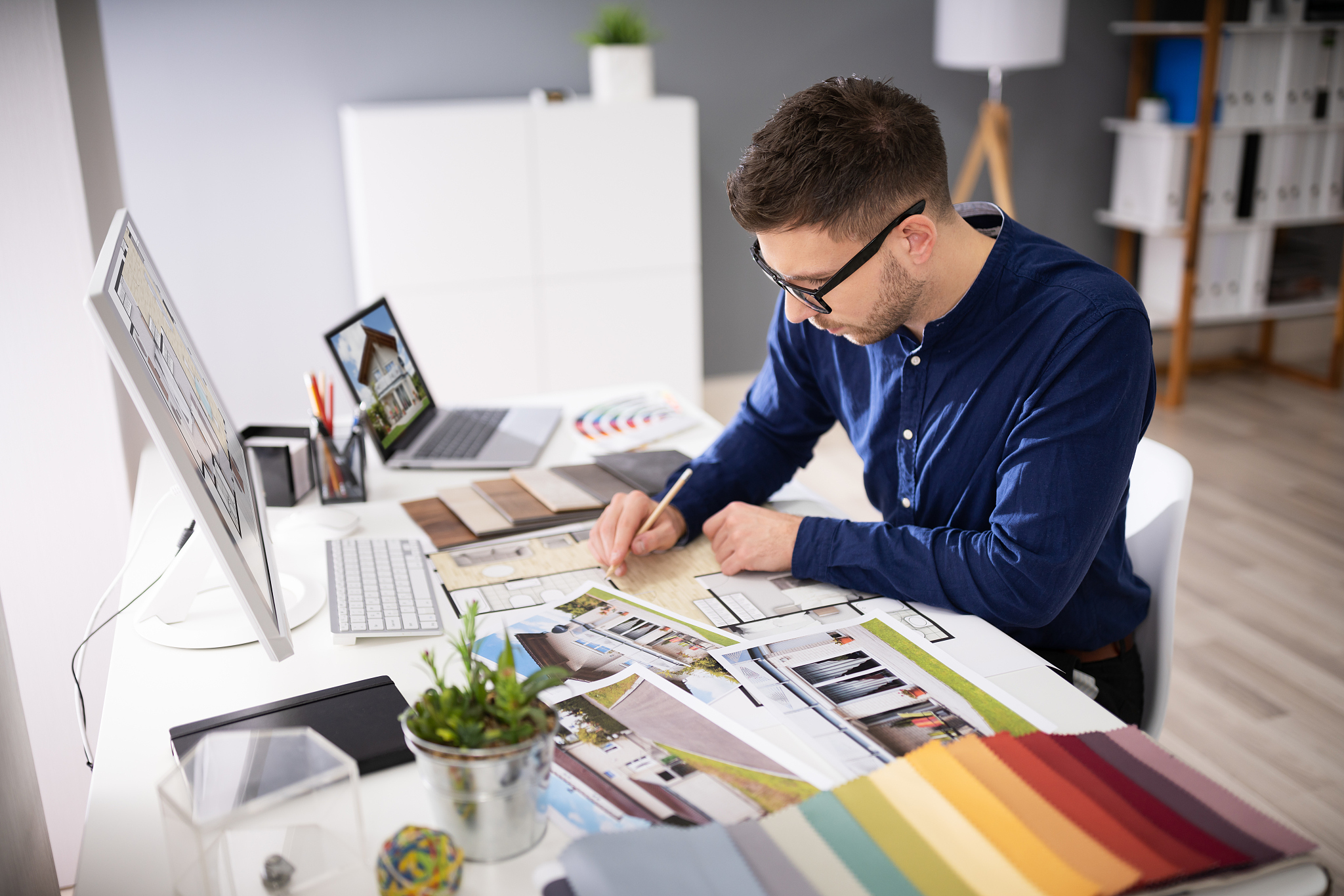 real estate designer working on computer