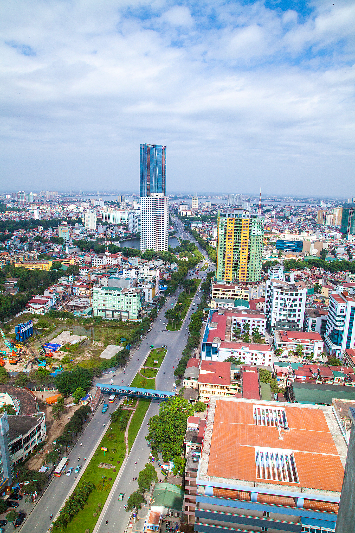 buildings against cloudy sky