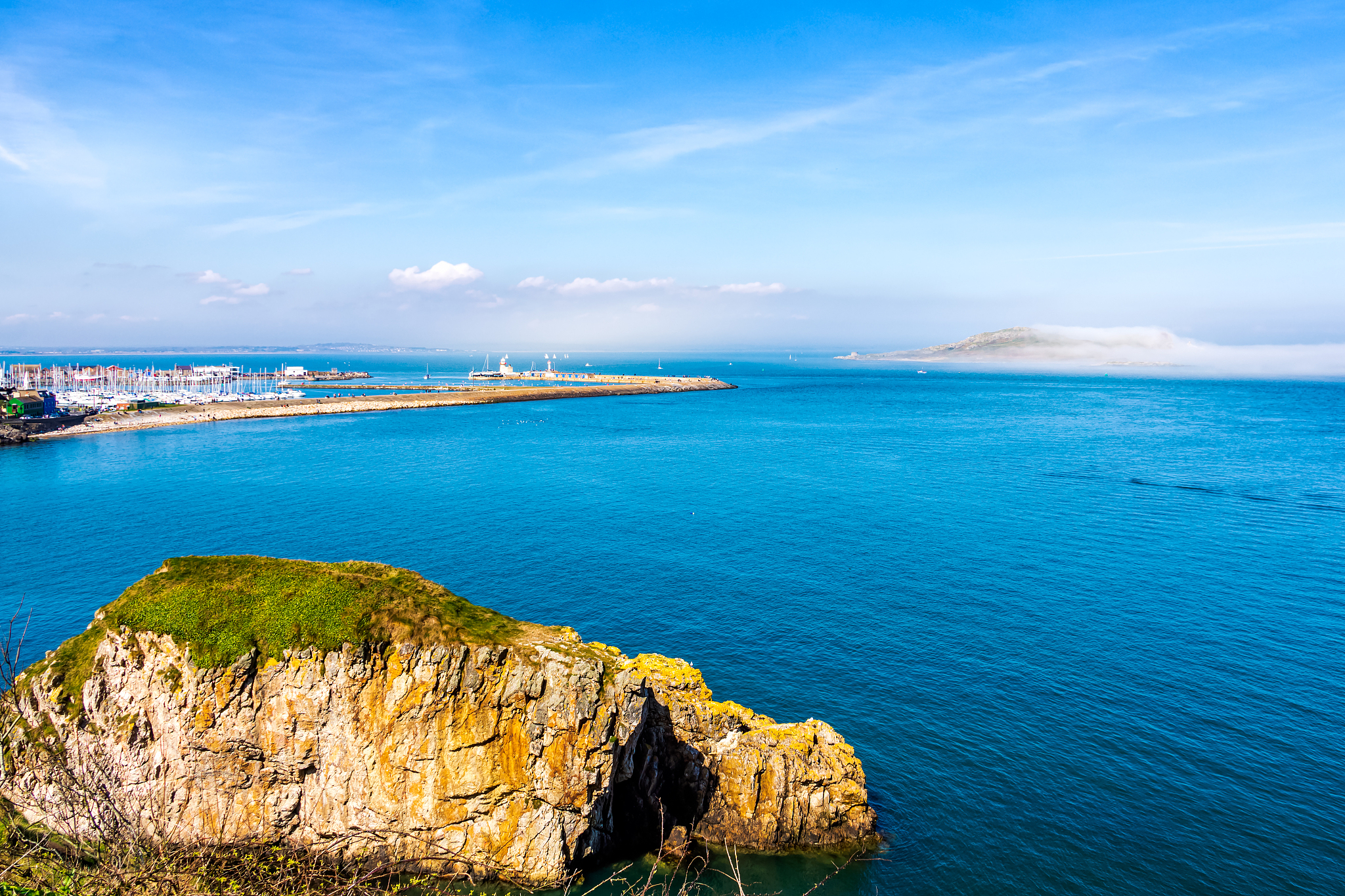 low lying fog covering irelands eye island, view from howth view