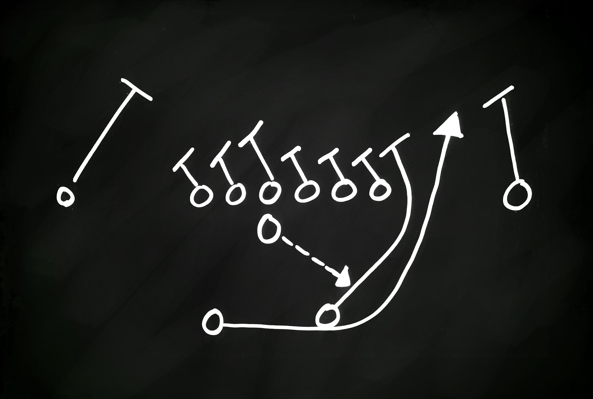 football play hand drawn on a chalkboard