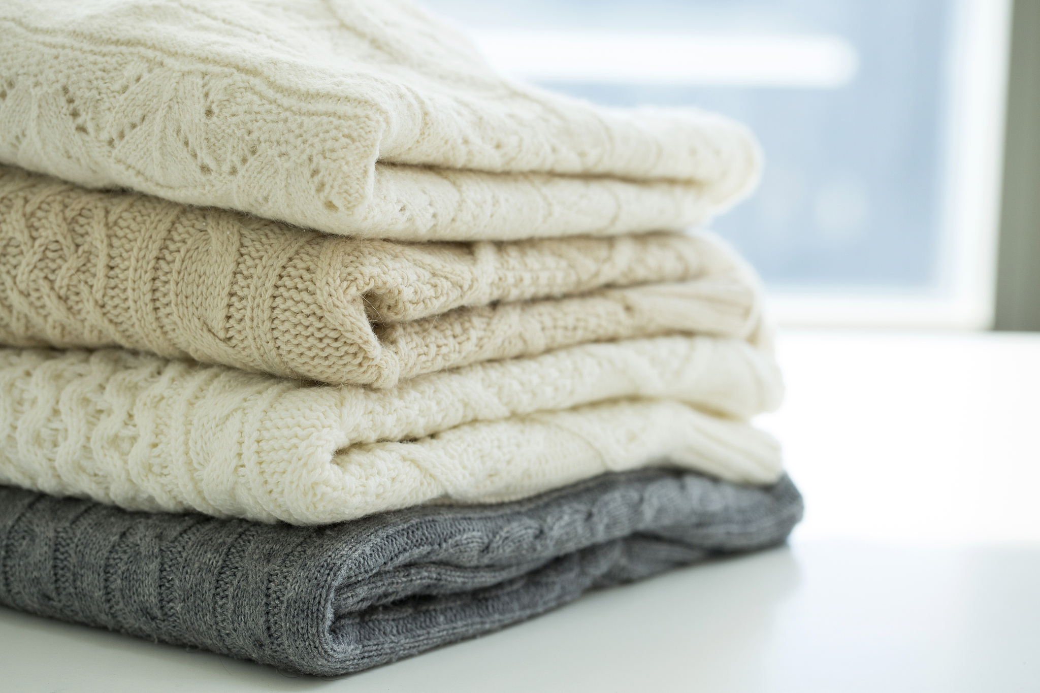 objects photo for winther season. sweater, tangerine, hot tea or