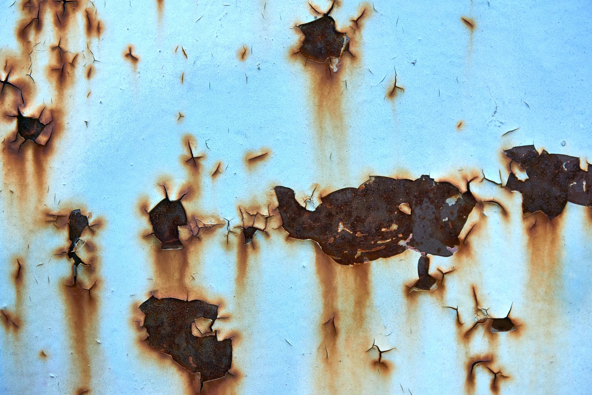 cracked color on a wall outside