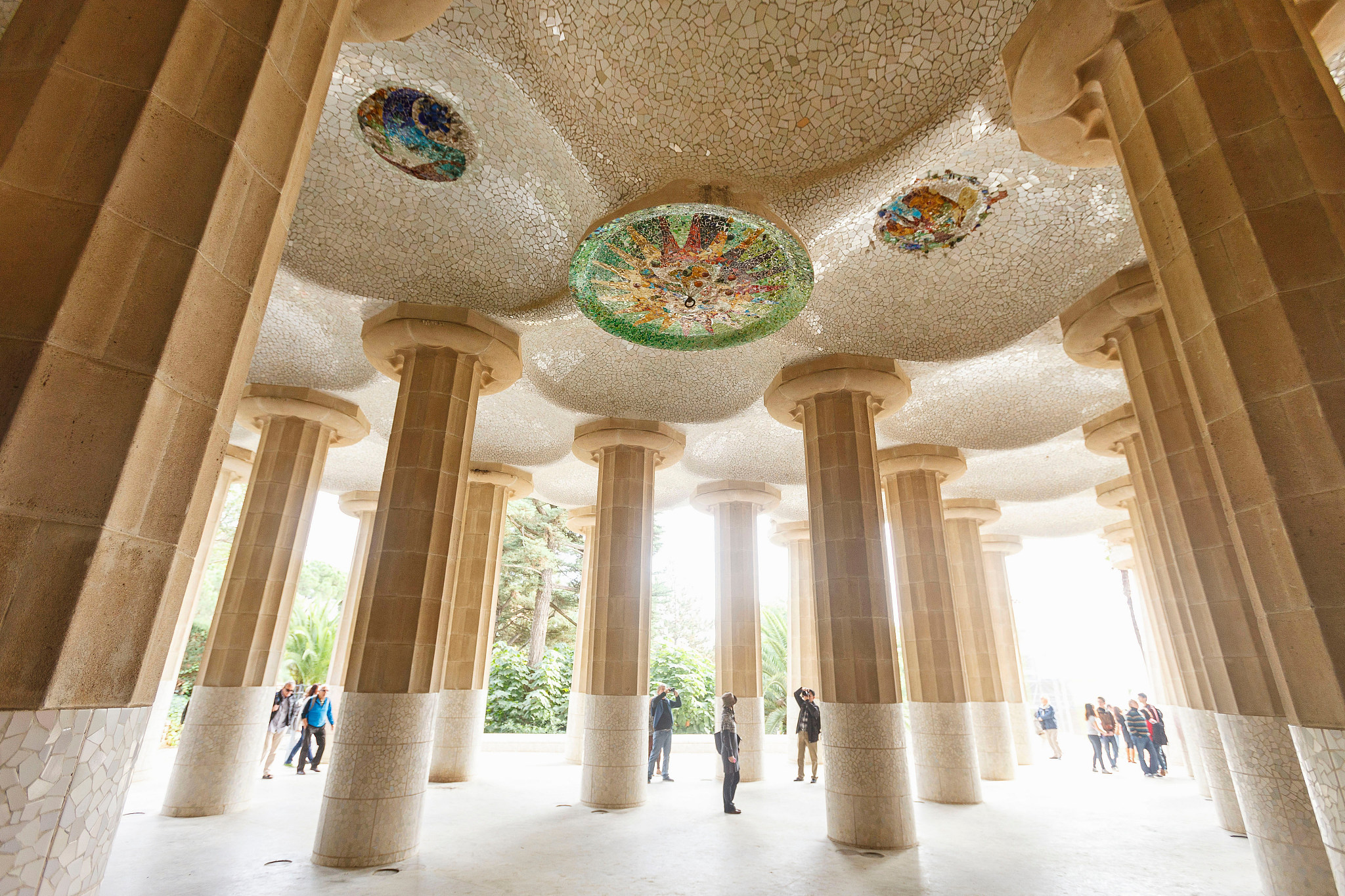 tourists at park guell, barcelona, spain