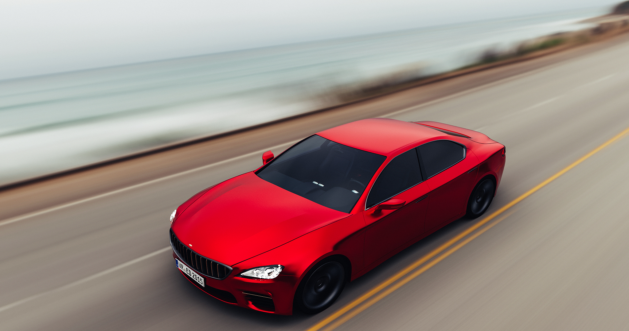 car driving on a road by sea