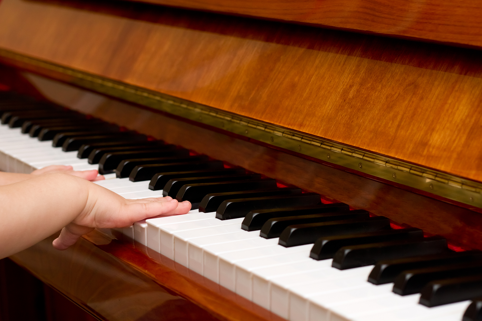 small child playing piano