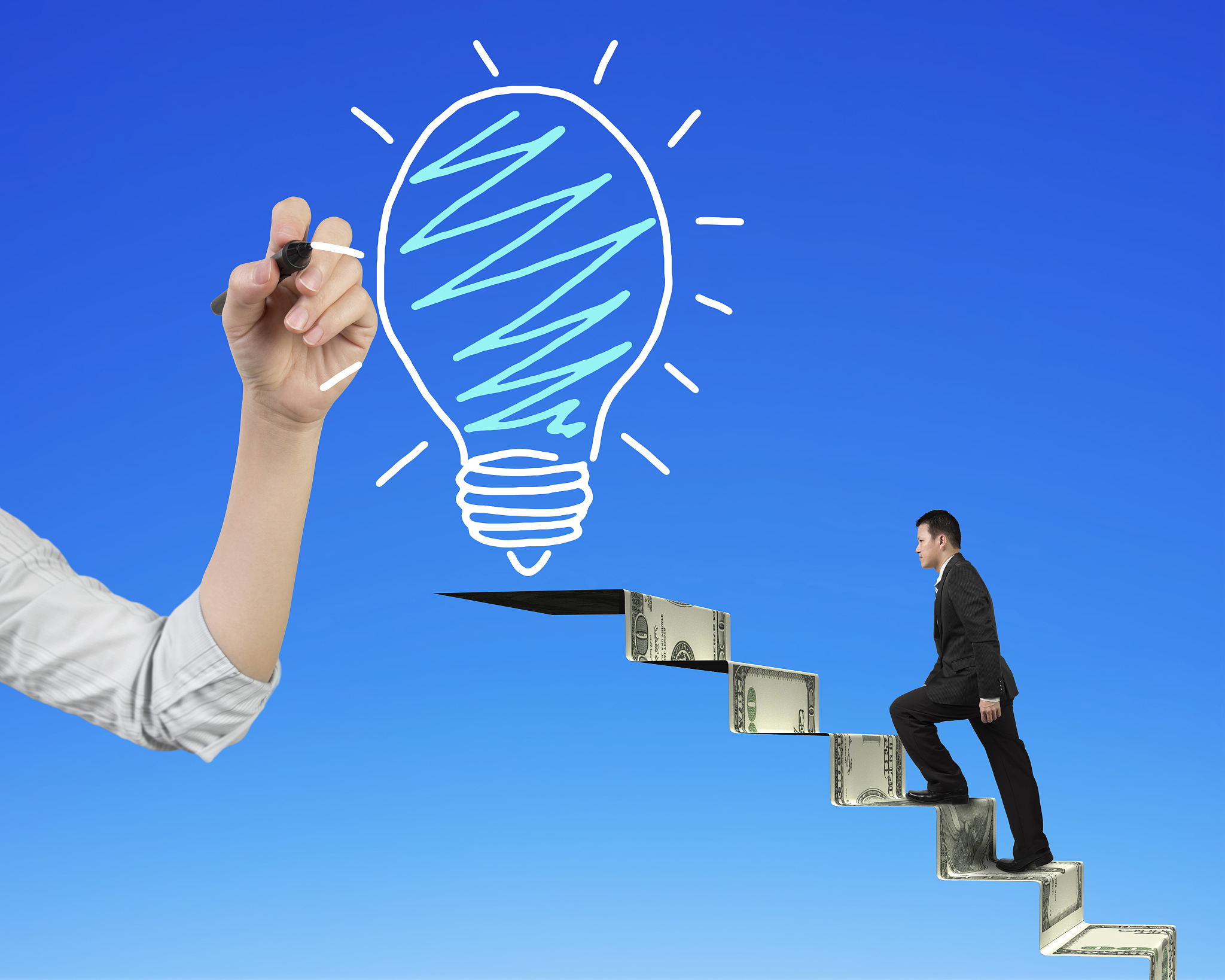 businessman climbing money stairs toward light bulb hand drawing