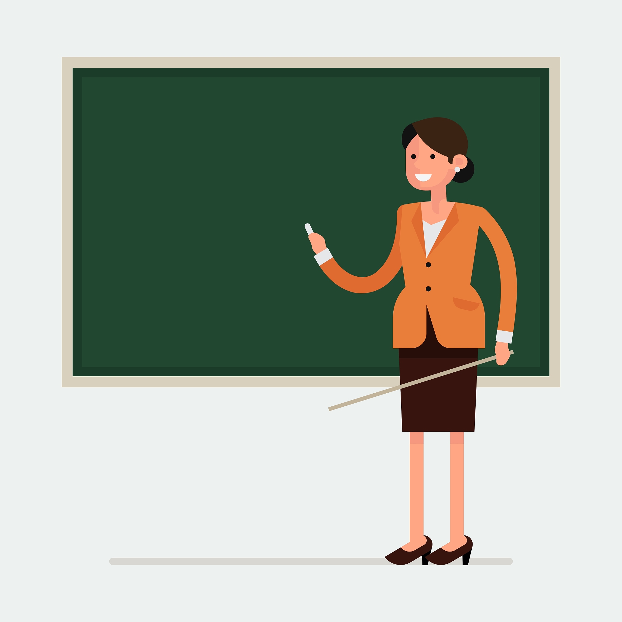 teacher in a classroom with a blackboard