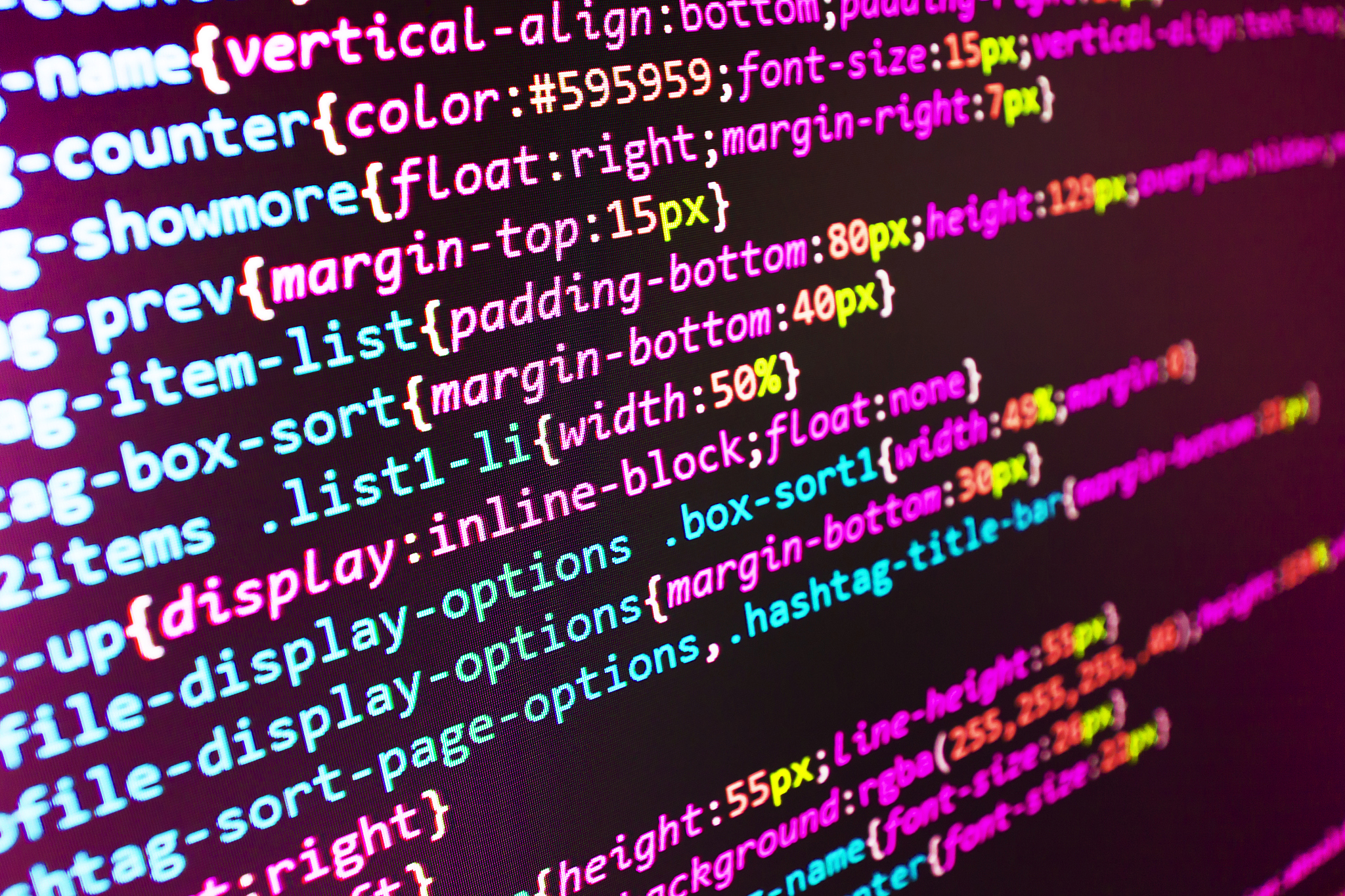 software developer programming code on computer