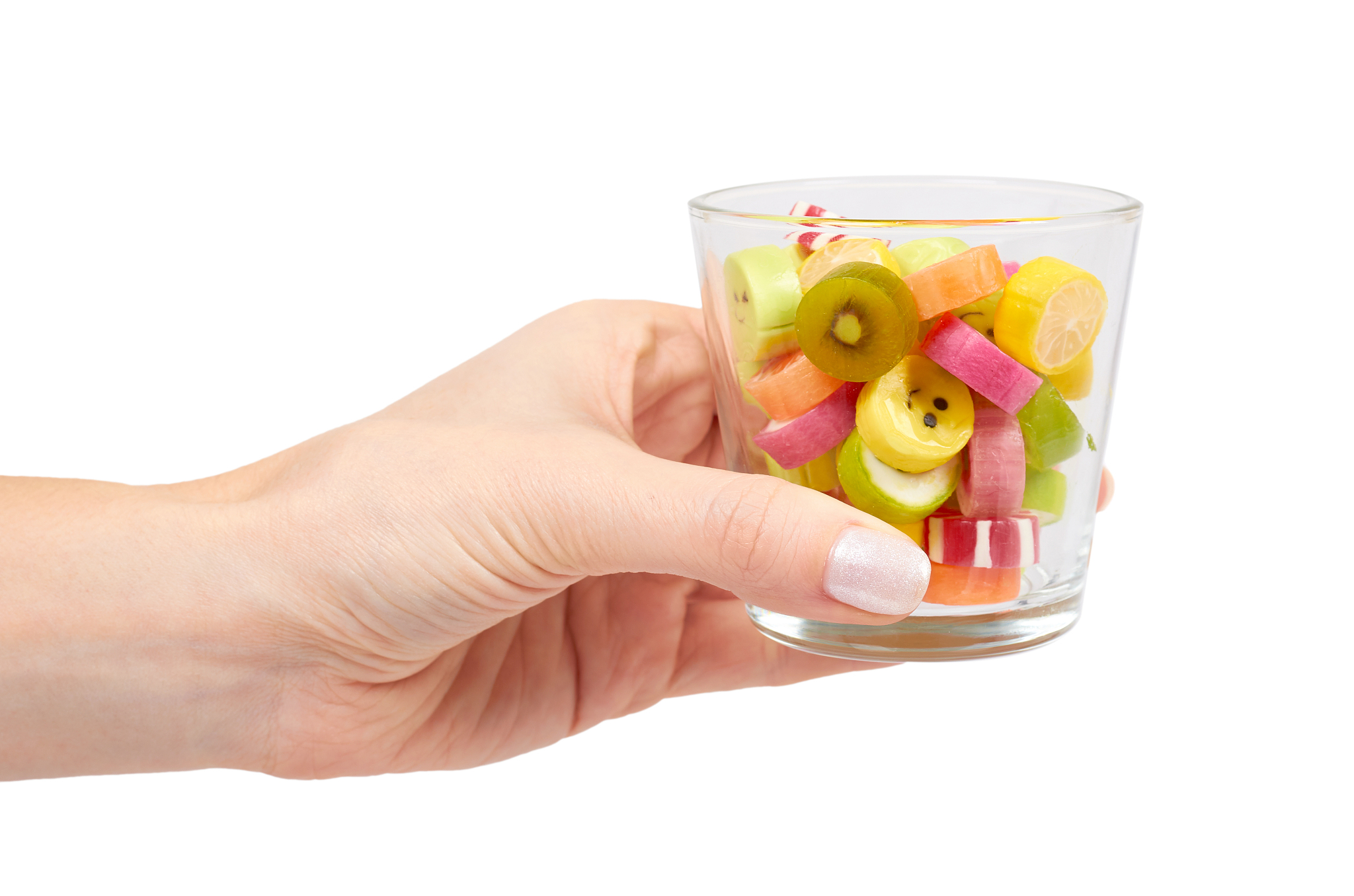 hand with colored round candy, sugar lollipop