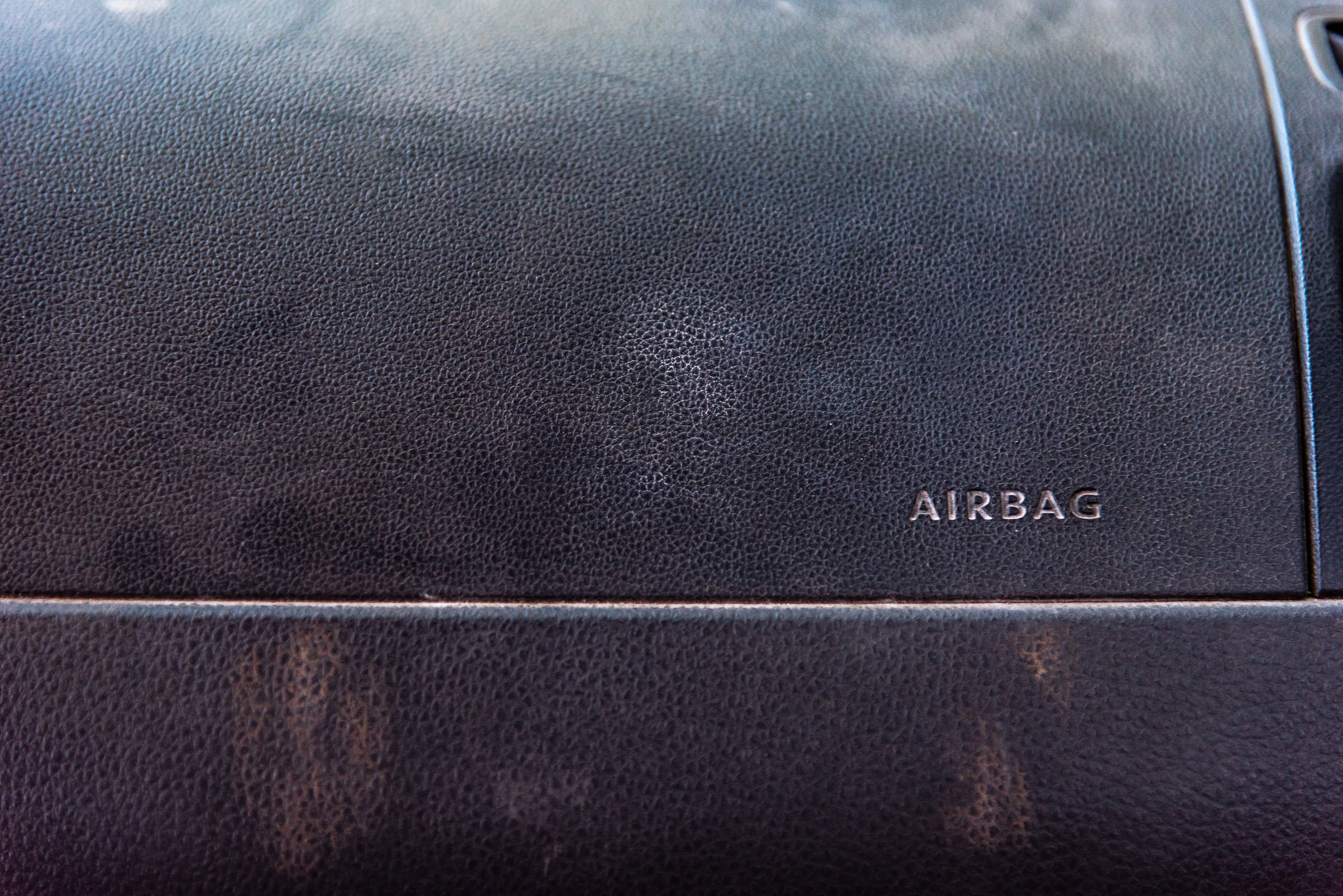 airbag logo inside a car on the front passenger seat side