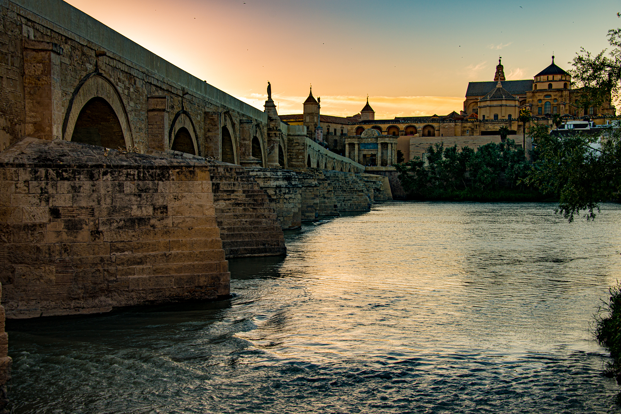 mosque-cathedral and roman bridge of cordoba, andalusia, spain