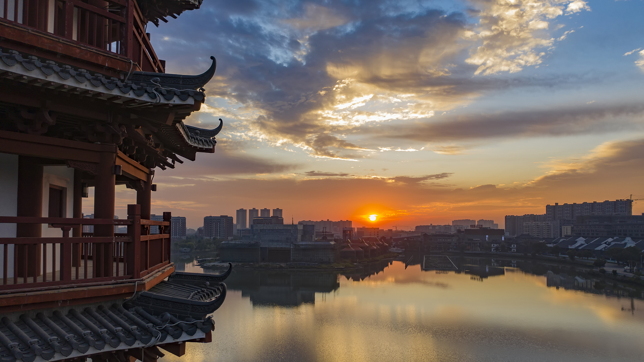 aerial photo of sunrise in huayang lake wetland park, dongguan, 