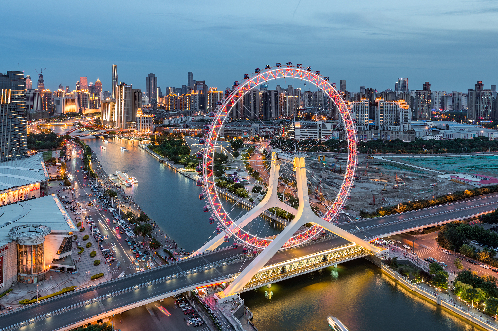 the cityscape of tianjin eye and tianjin urban skyline at dusk