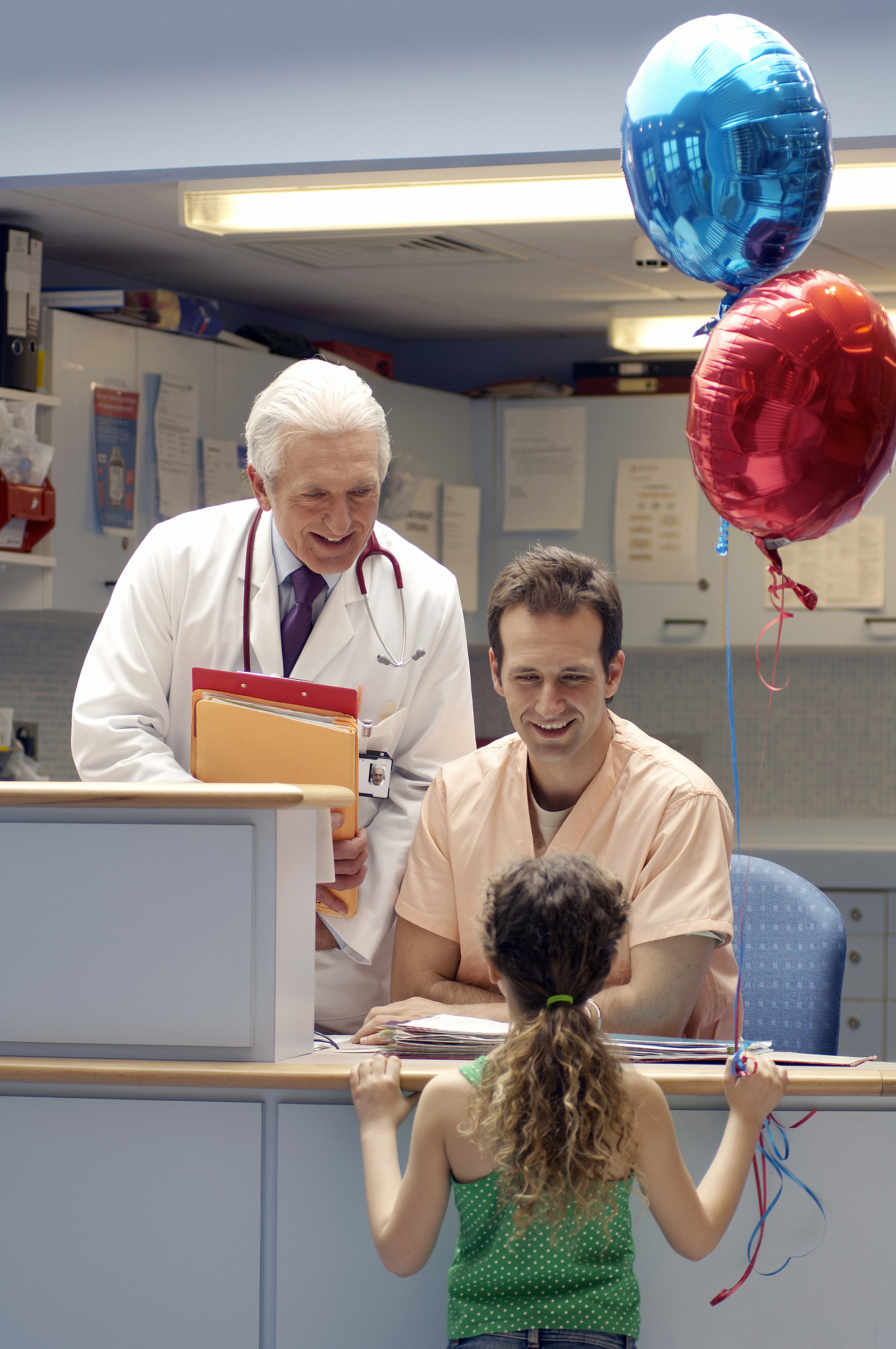young girl with balloons for a patient