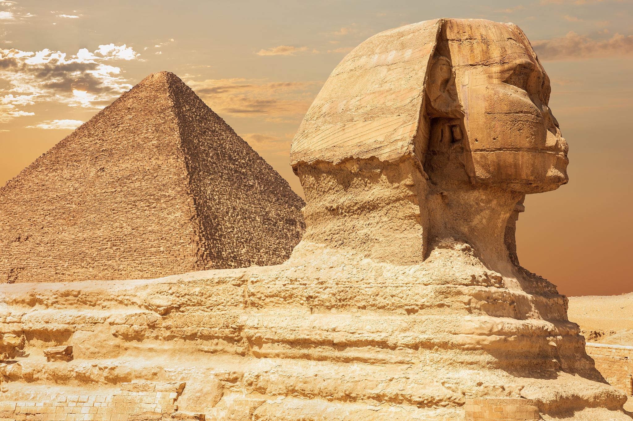 the sphinx and the pyramid of cheops, close view, giza, egypt