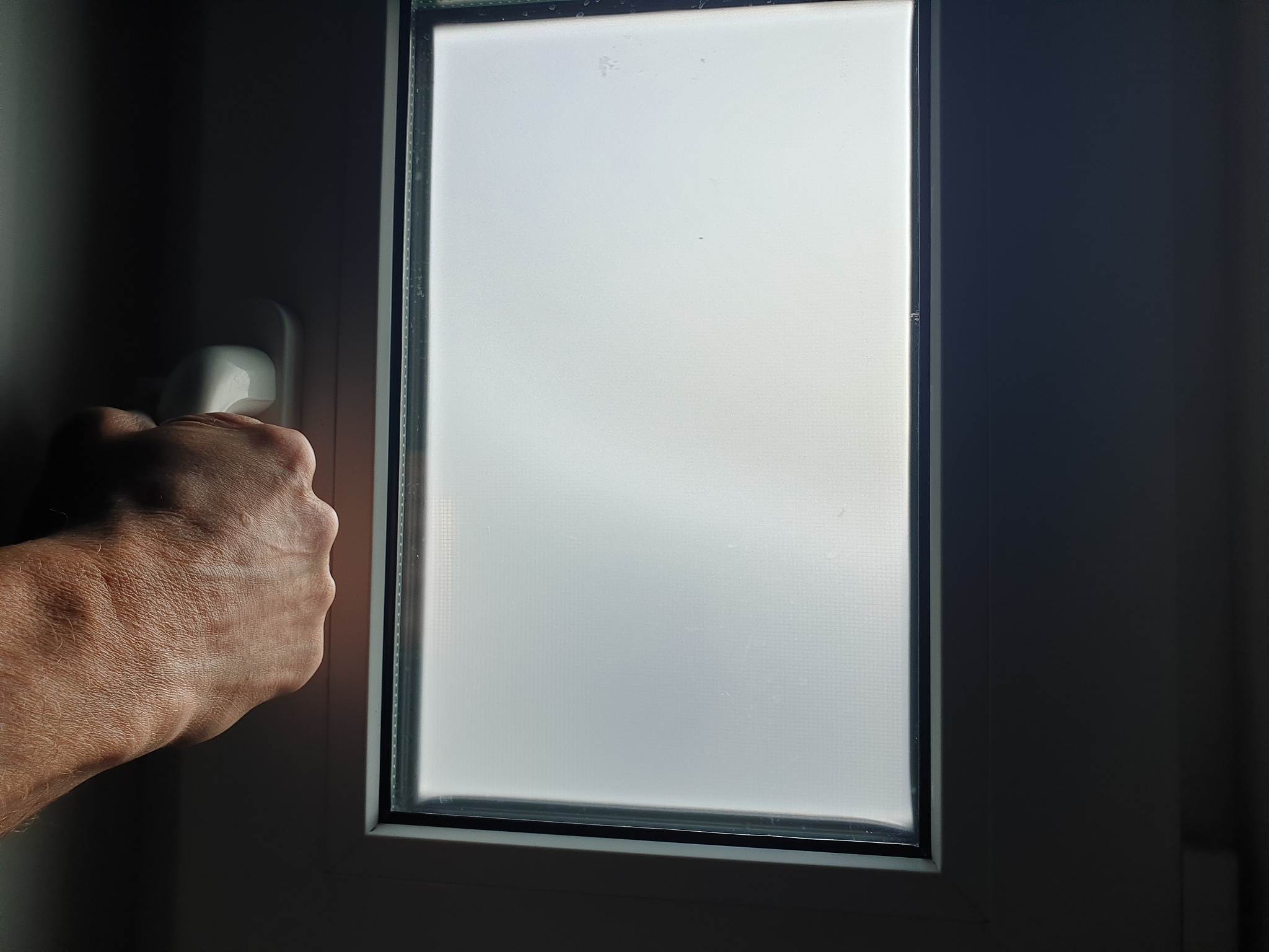 plastic window. open the window. widow in the close-up
