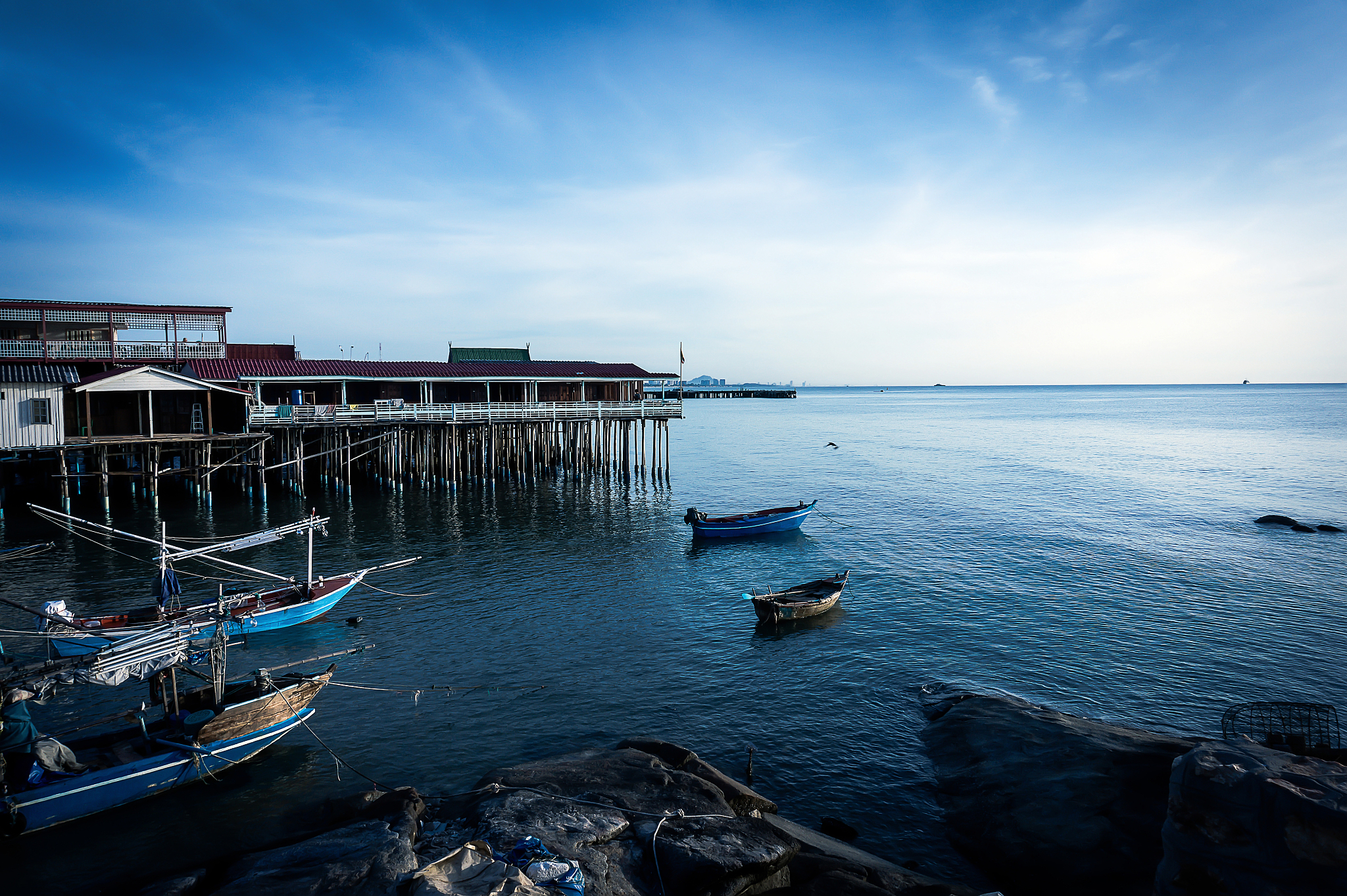 fishing boat and guesthouse  at sunrise