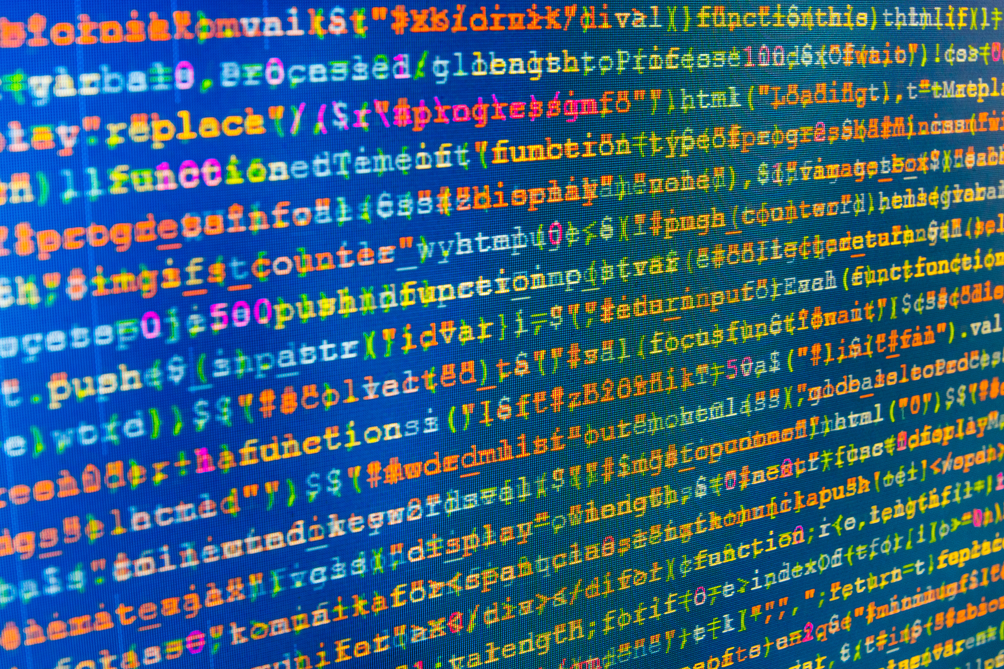 software developer programming code on computer