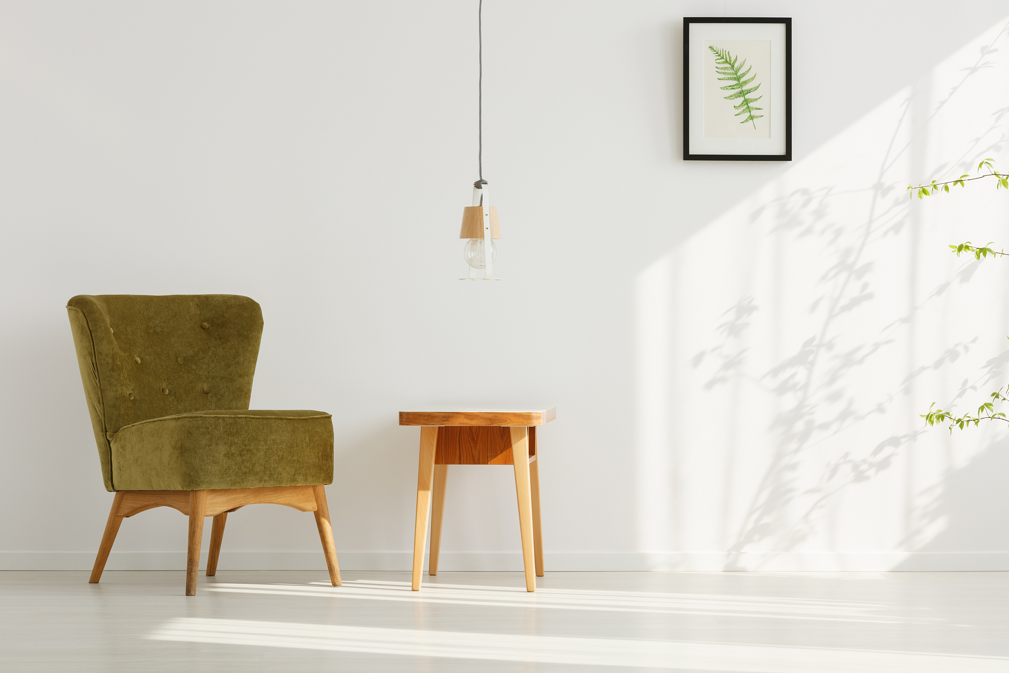 room with comfortable green chair
