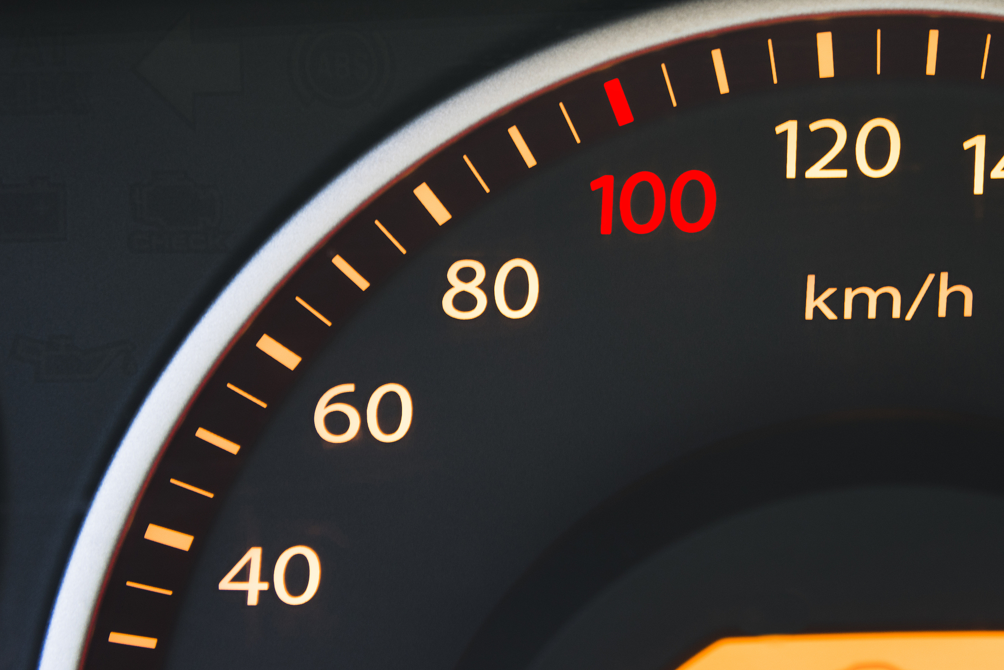 photography of speed scale on the dashboard