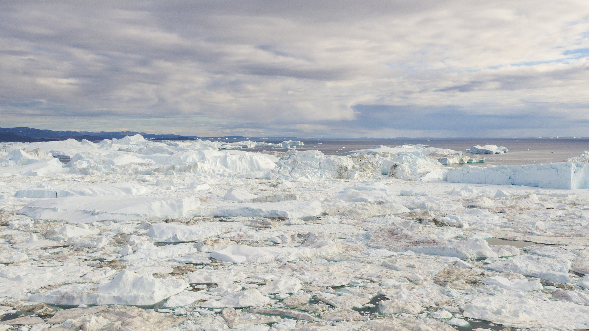global warming and climate change - icebergs from melting glacie