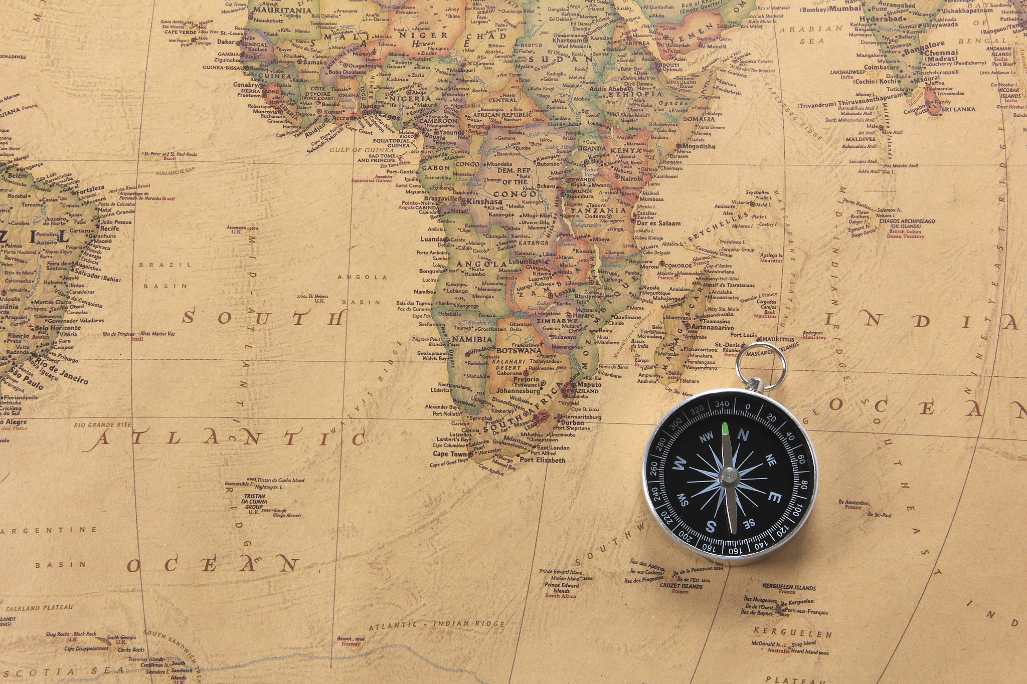 world map and compass