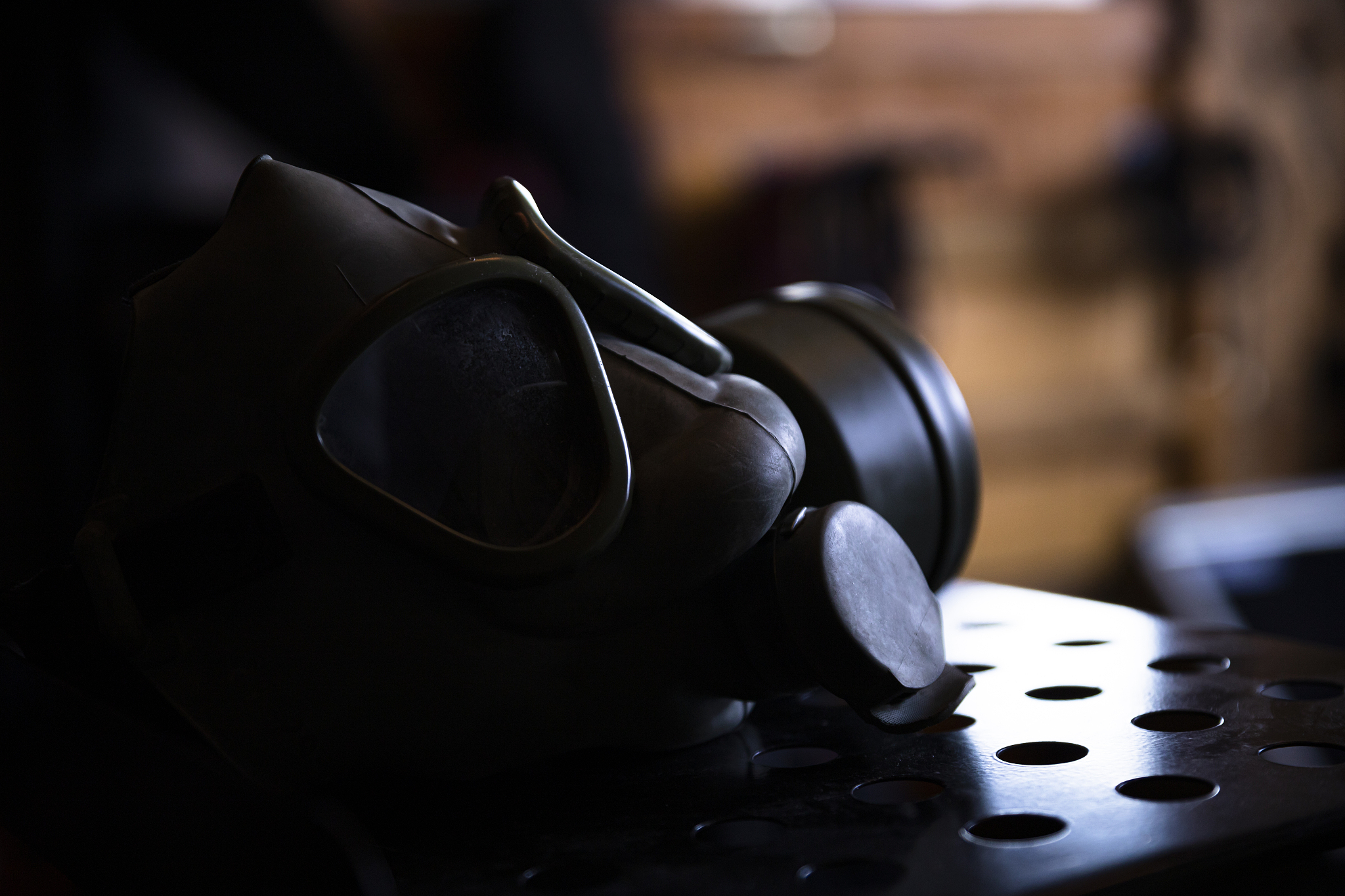 military gas mask in dark ambient. coronavirus, covid19 pandemic