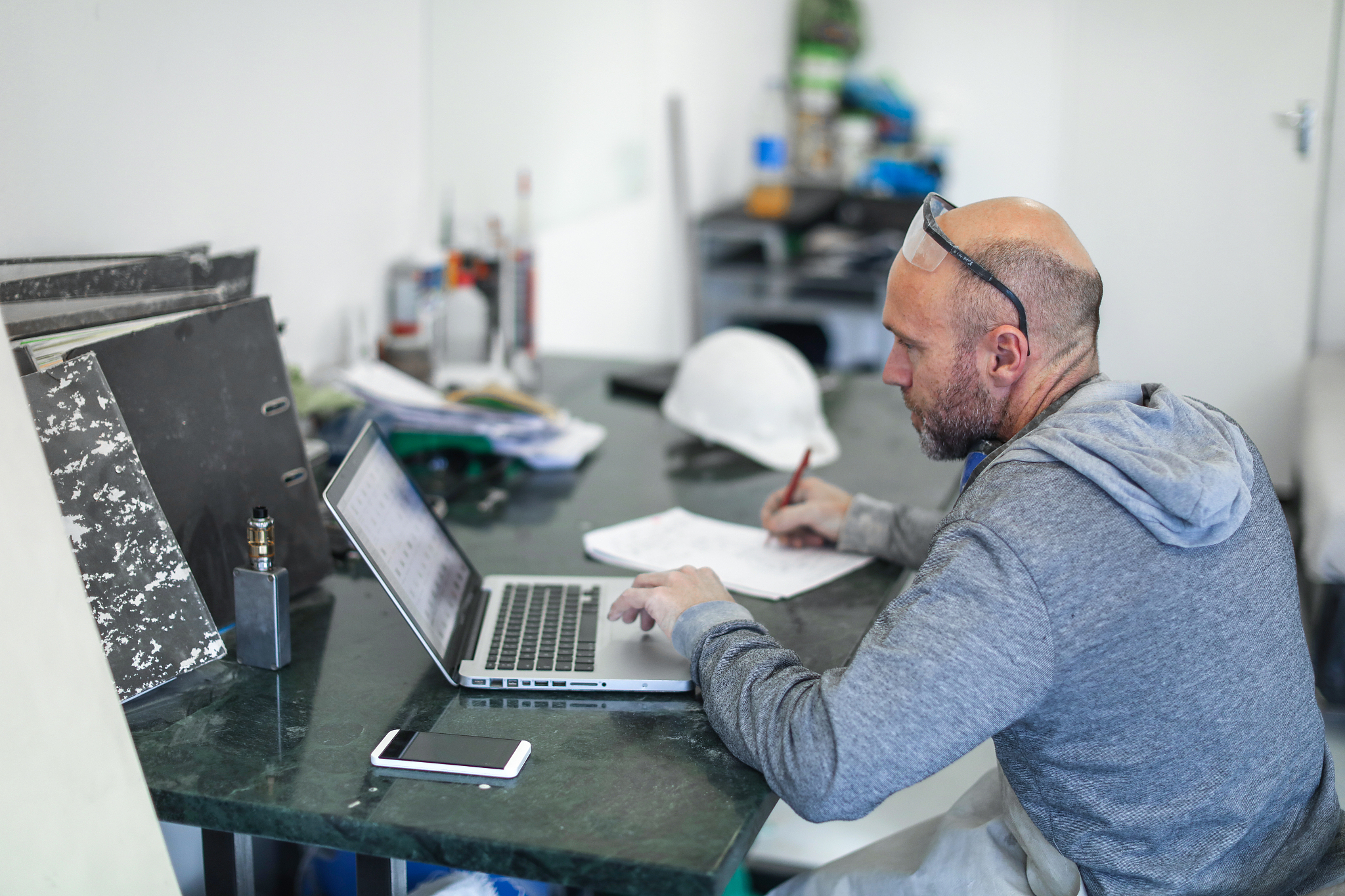 worker planning in his workshop.