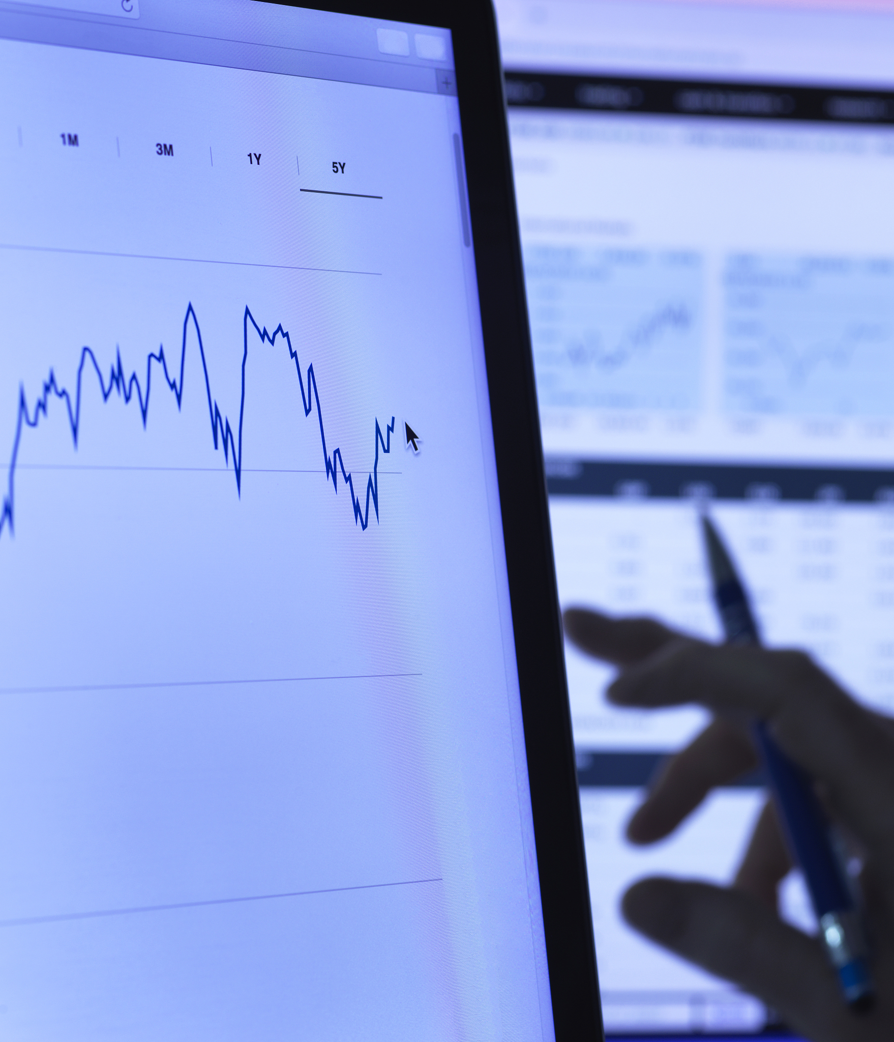 financial services, stock analyst researching share price data o