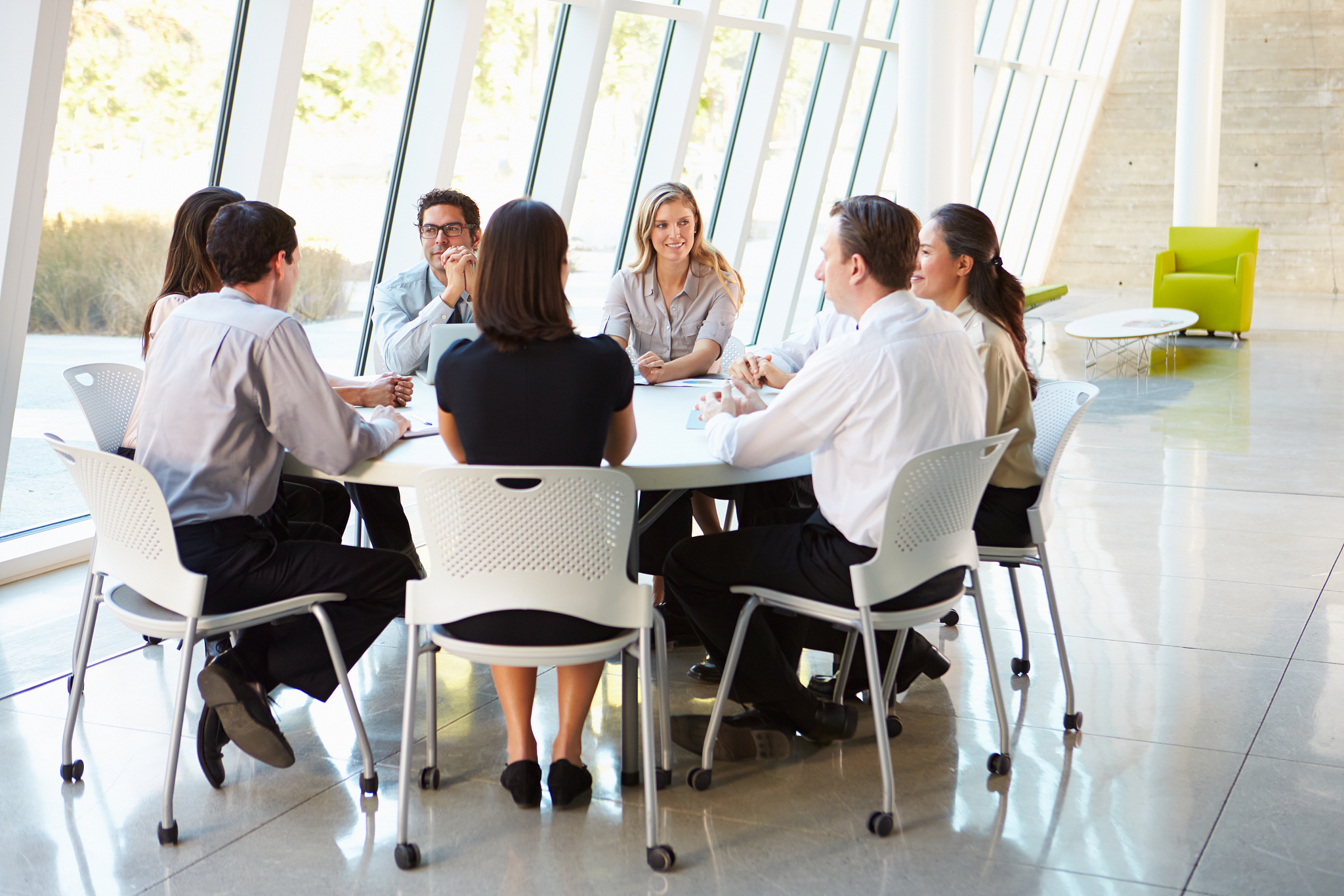 business people having board meeting in office