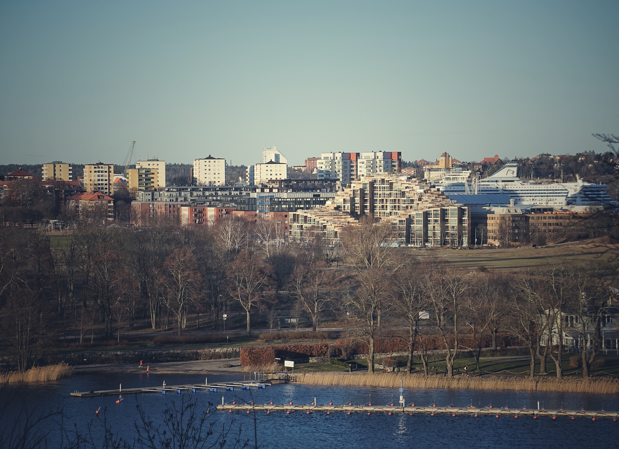 river amidst buildings against clear sky