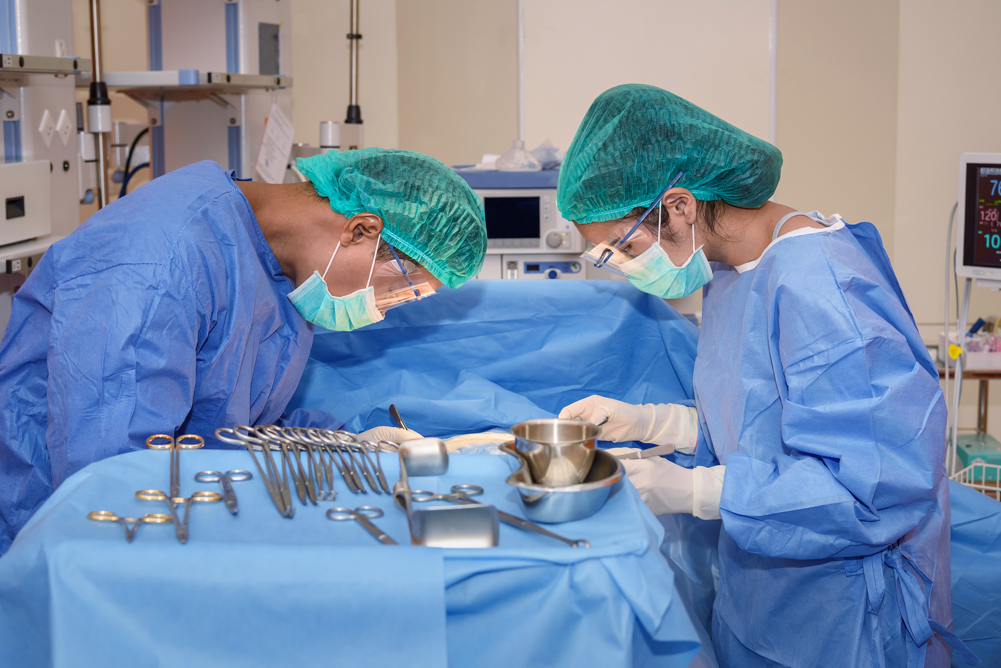 team professional surgeon in the operating room