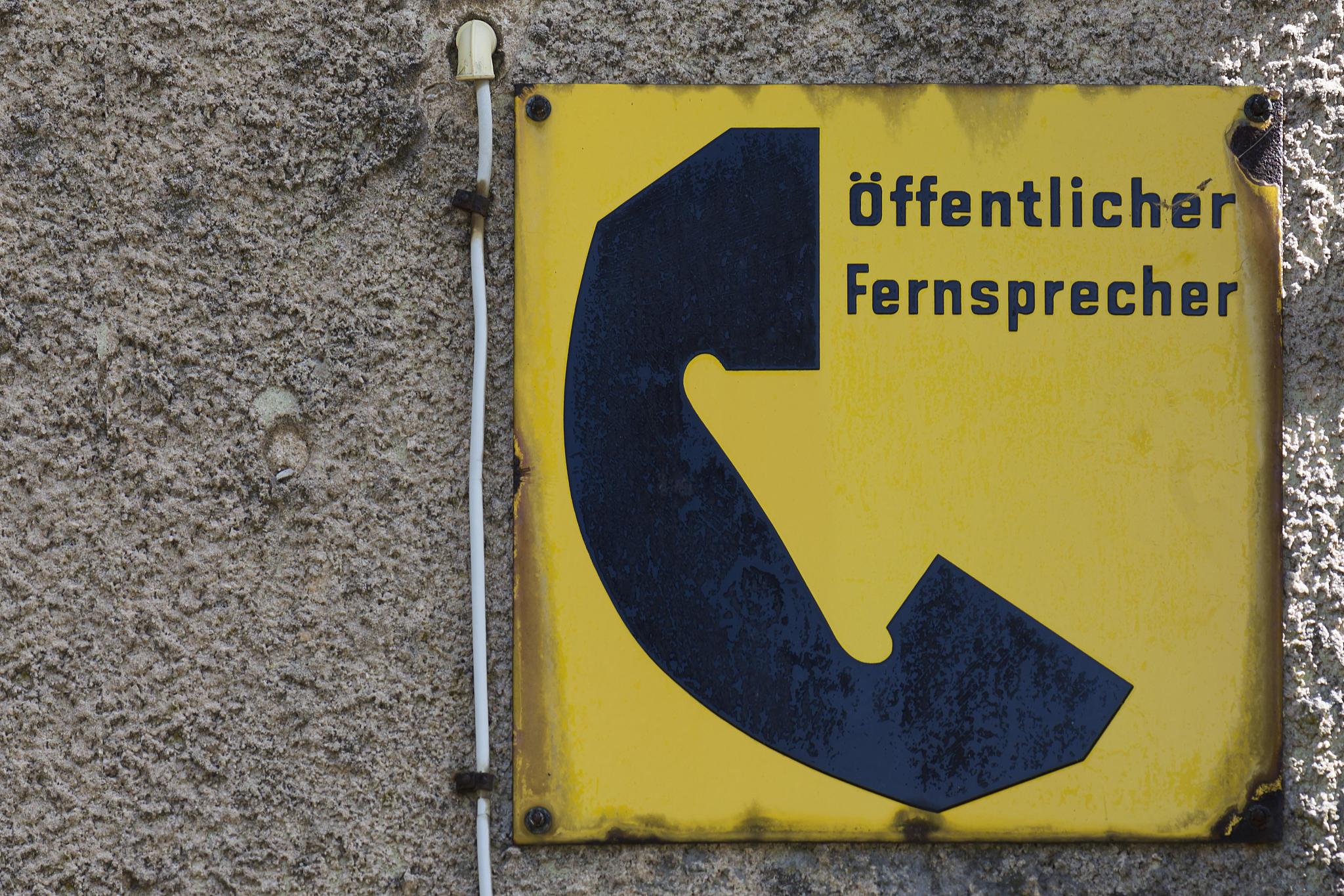 information sign, tin sign, public telephone from the 1950s of t