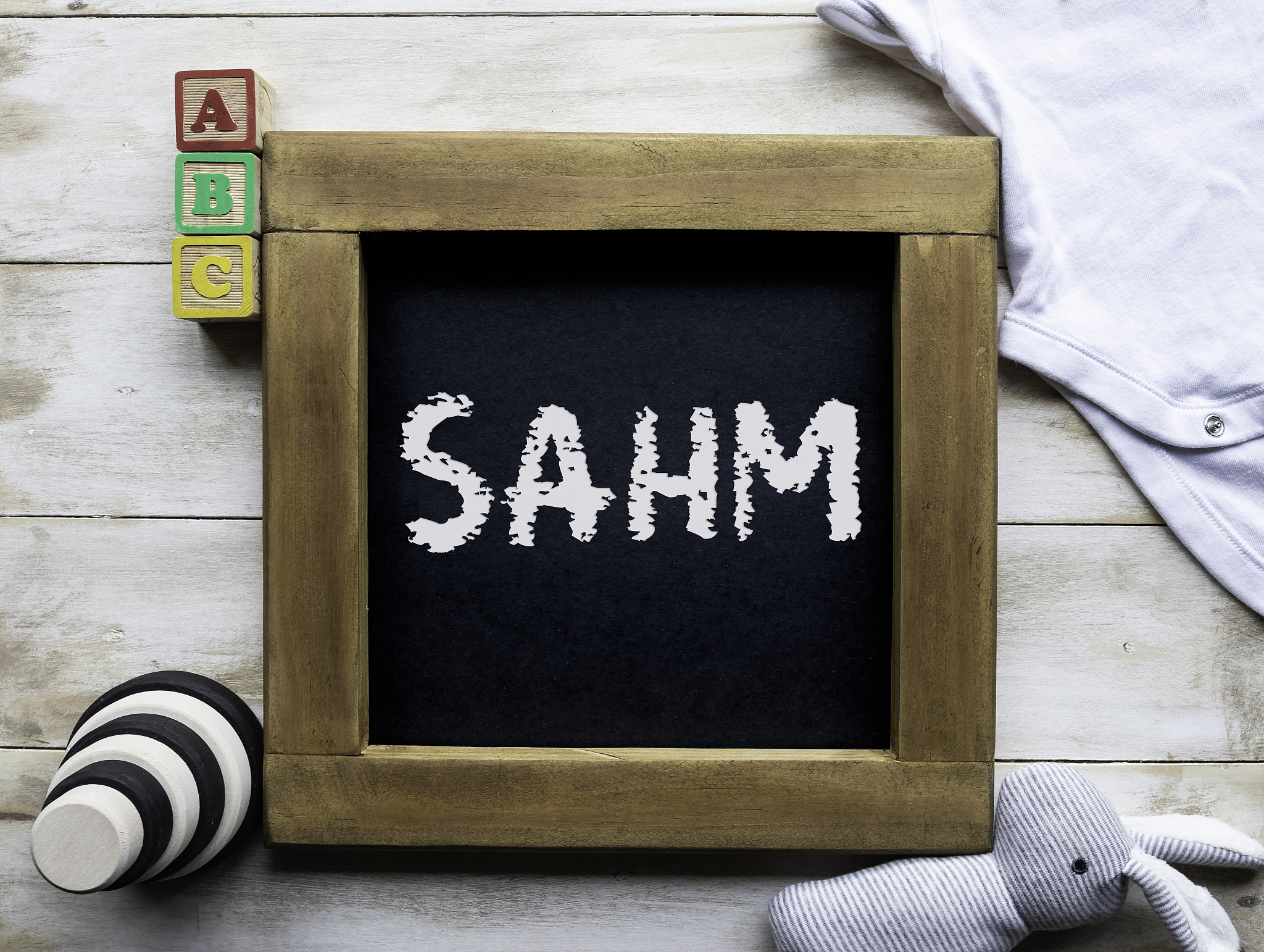 sahm (stay at home mom/mum) message written on a chalkboard surr