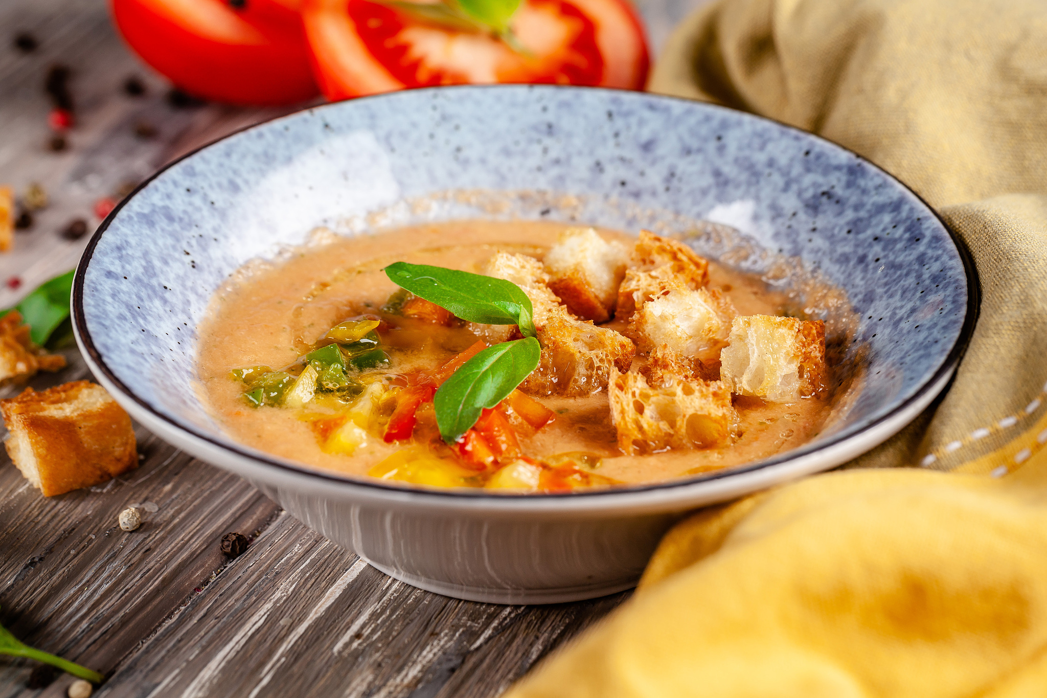 concept of spanish cuisine. tomato soup gazpacho from fresh toma