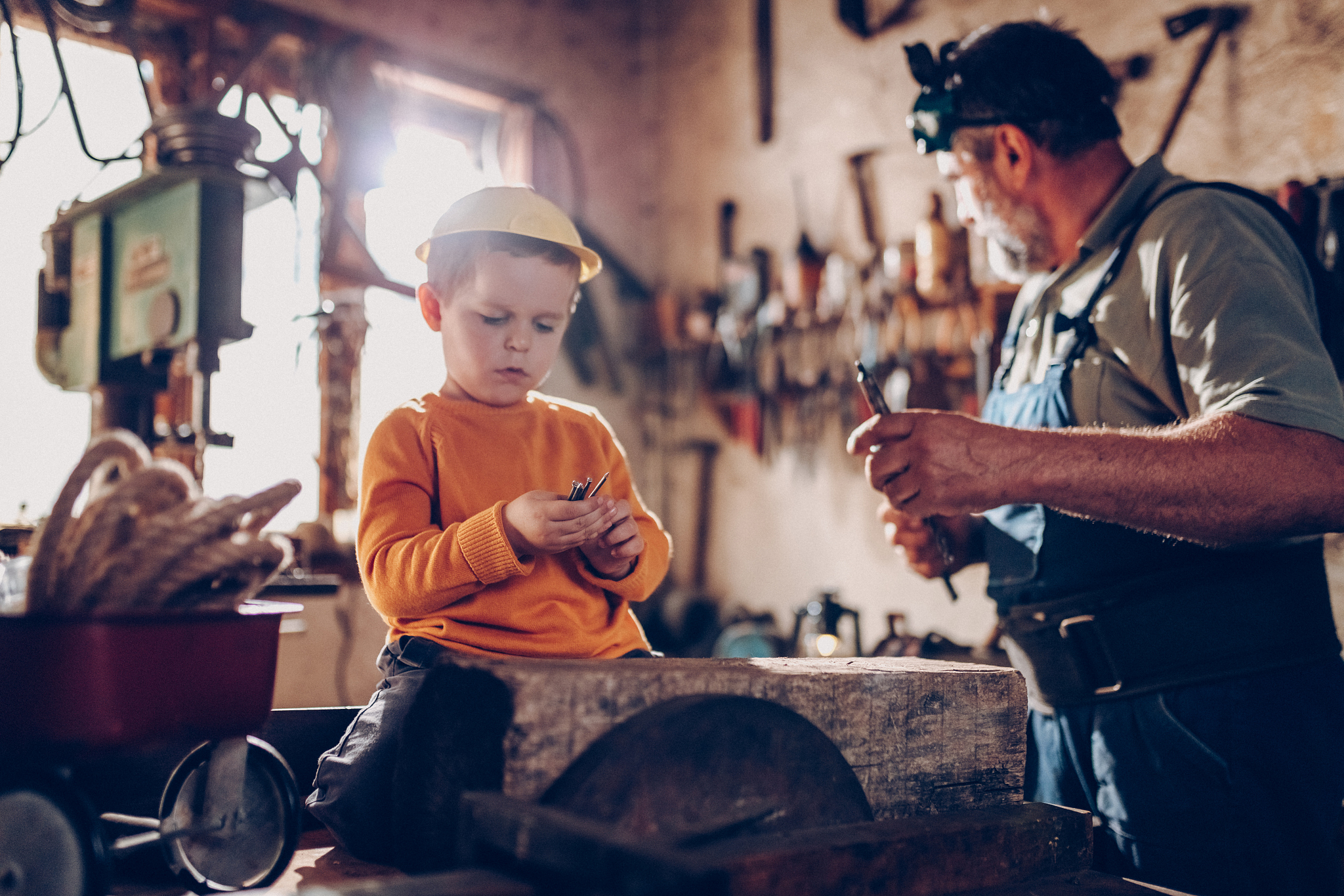 grand parent and grand son in garage