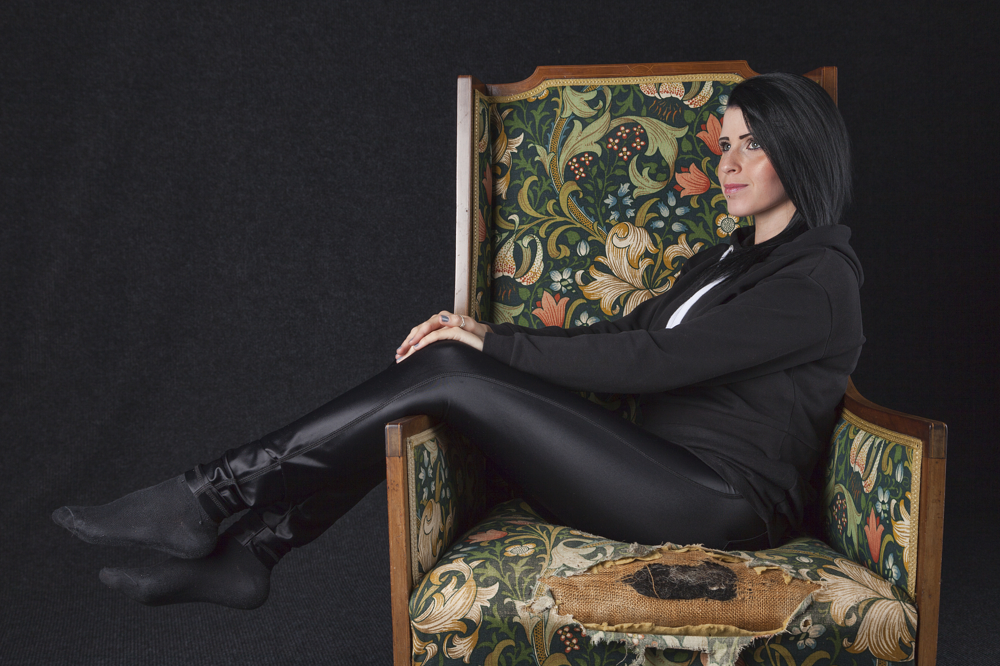 woman in an old armchair