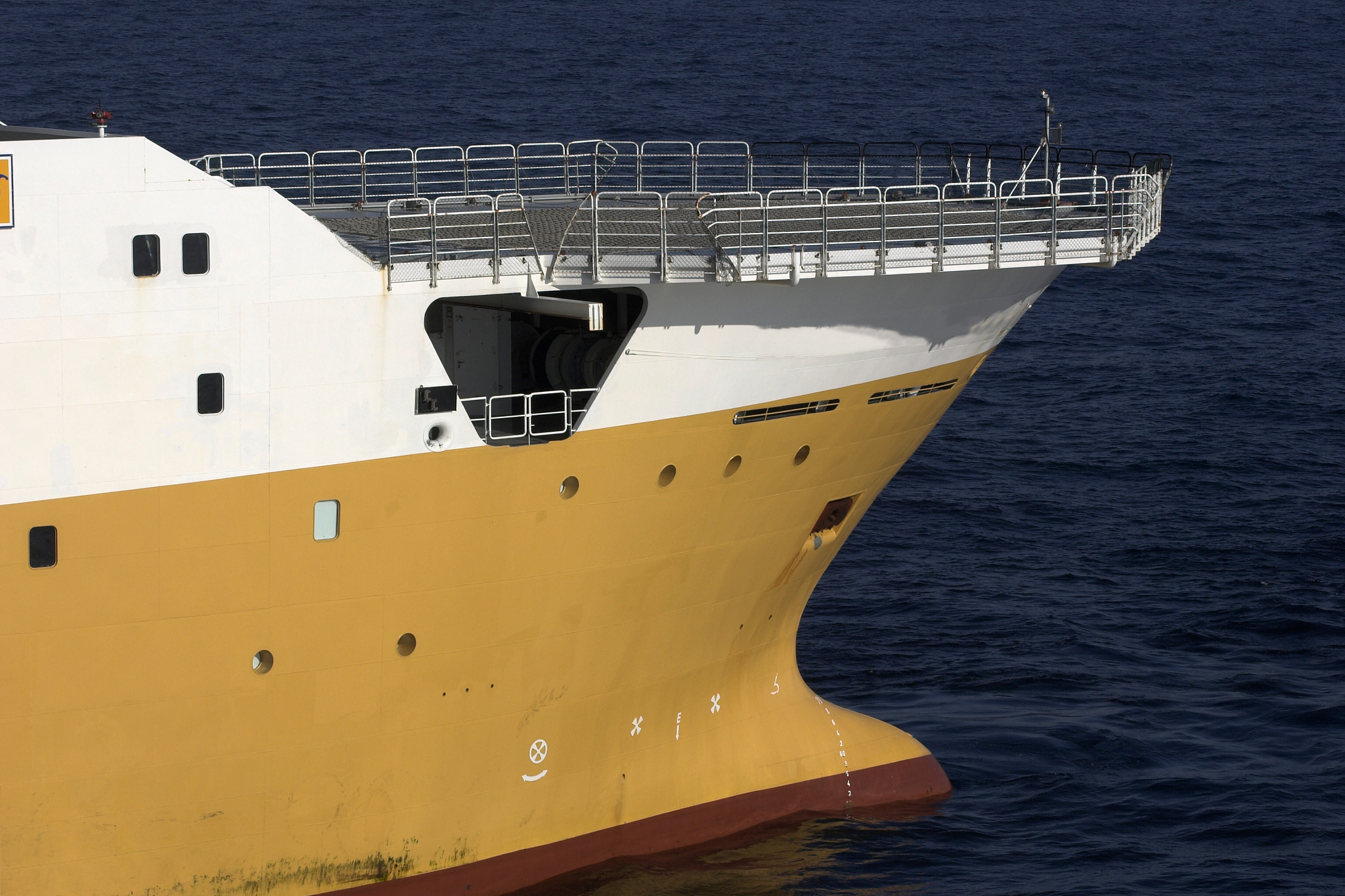 bow and helipad on large boat at sea