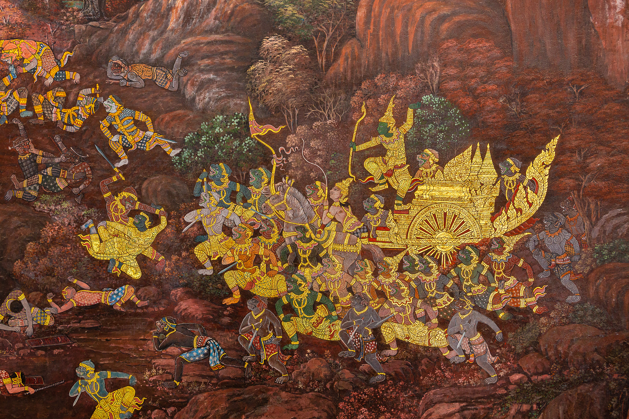 gold color of old mural is the story of ramakian ,ancient fresco
