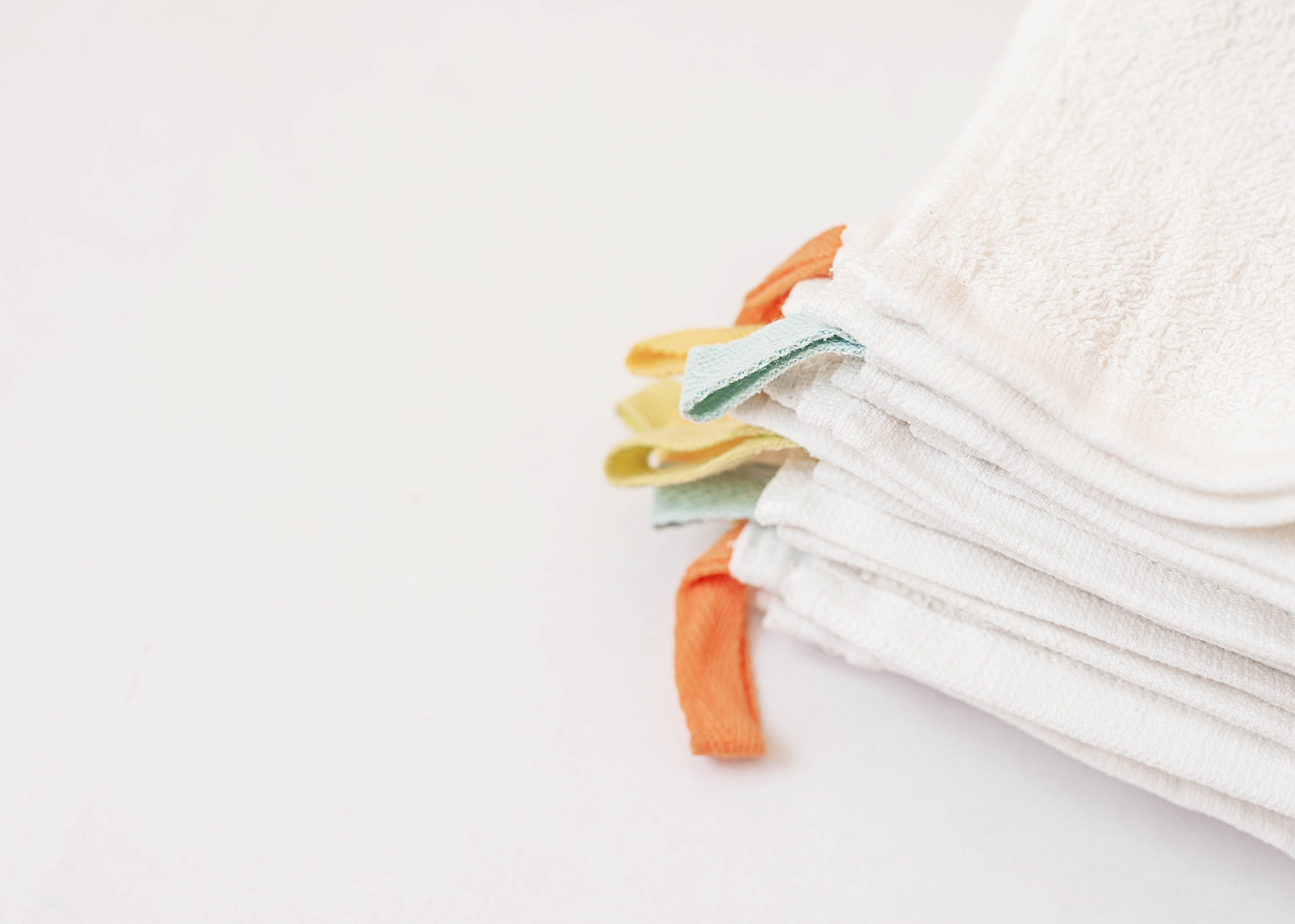 white towel on blue background . white spa towels on blue backgr