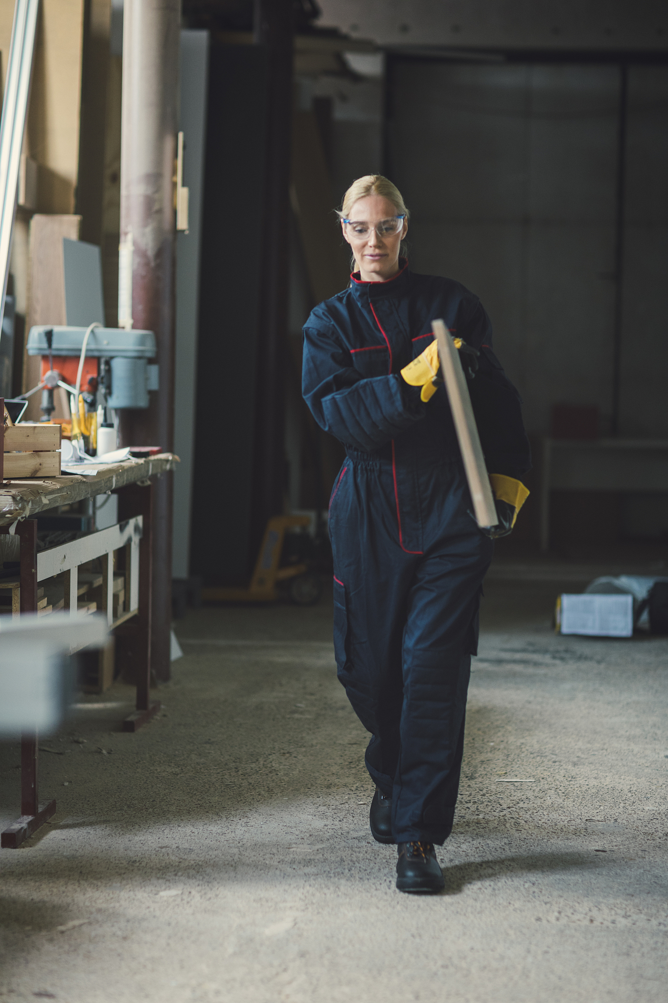 female carpenter working in her workshop