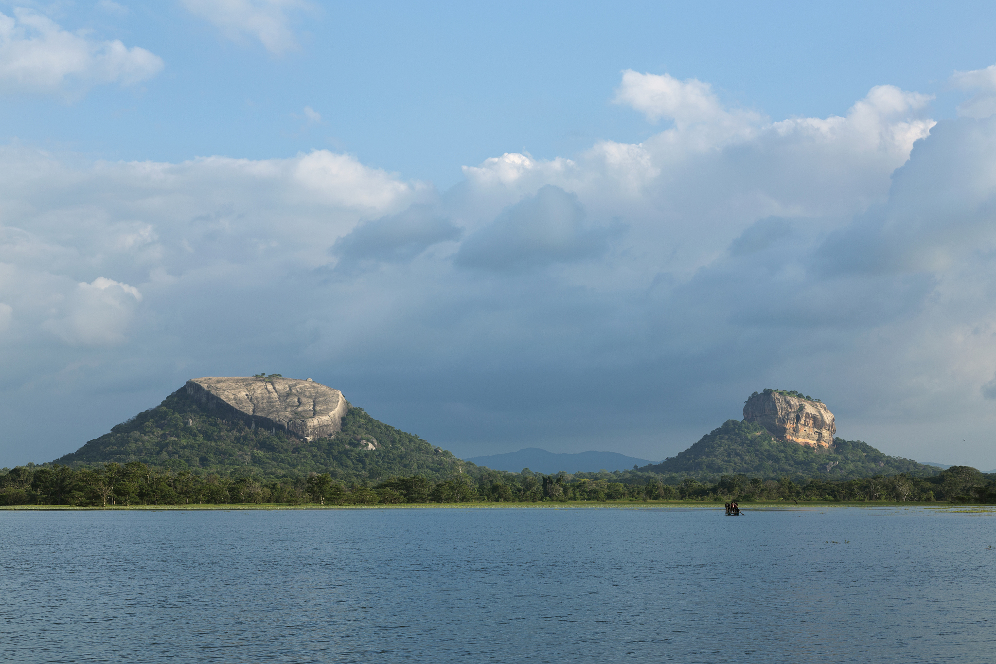 pidurangala rock and sigiriya rock seen from across dhalkote lak