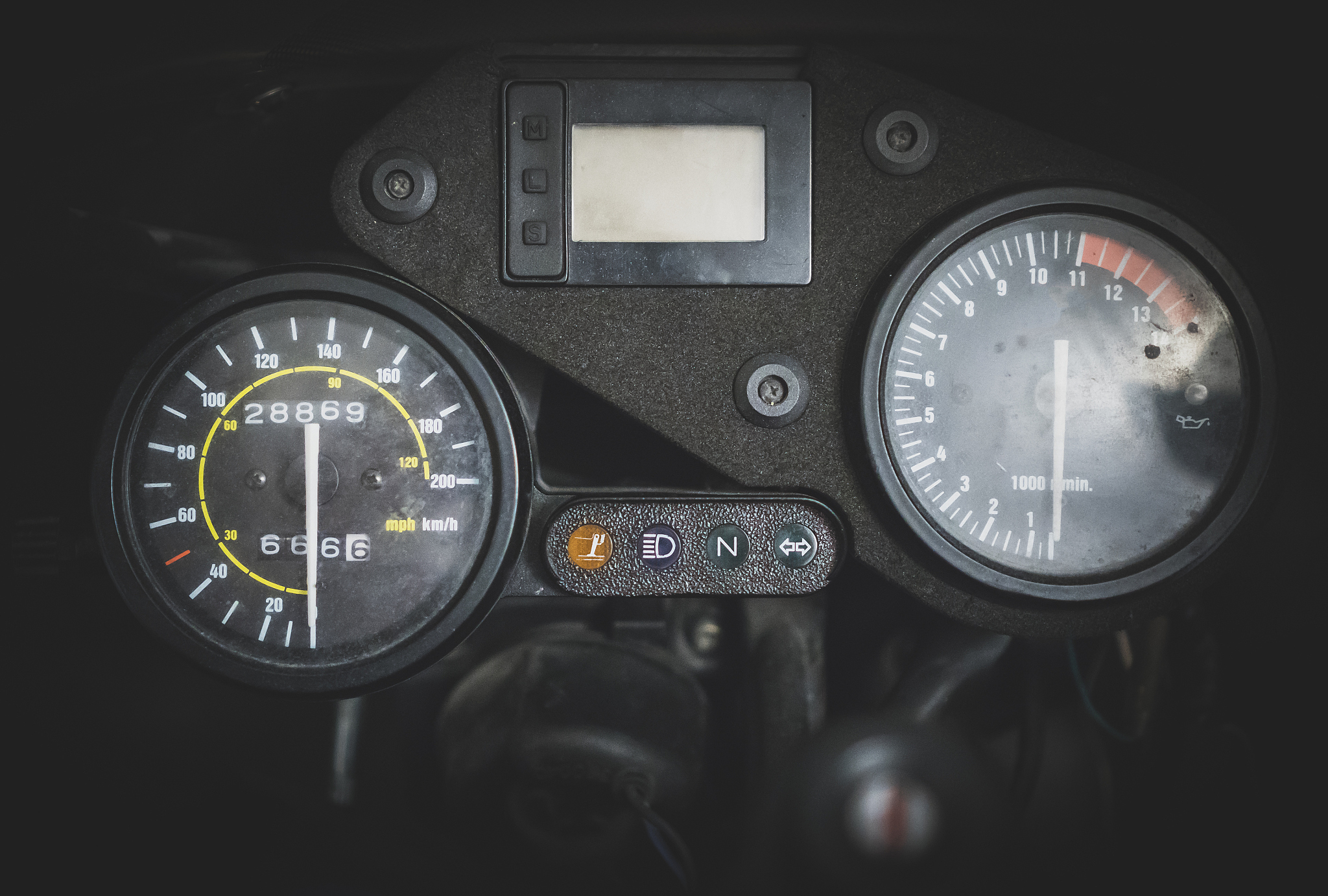 close-up view of modern motorcycle dashboard.