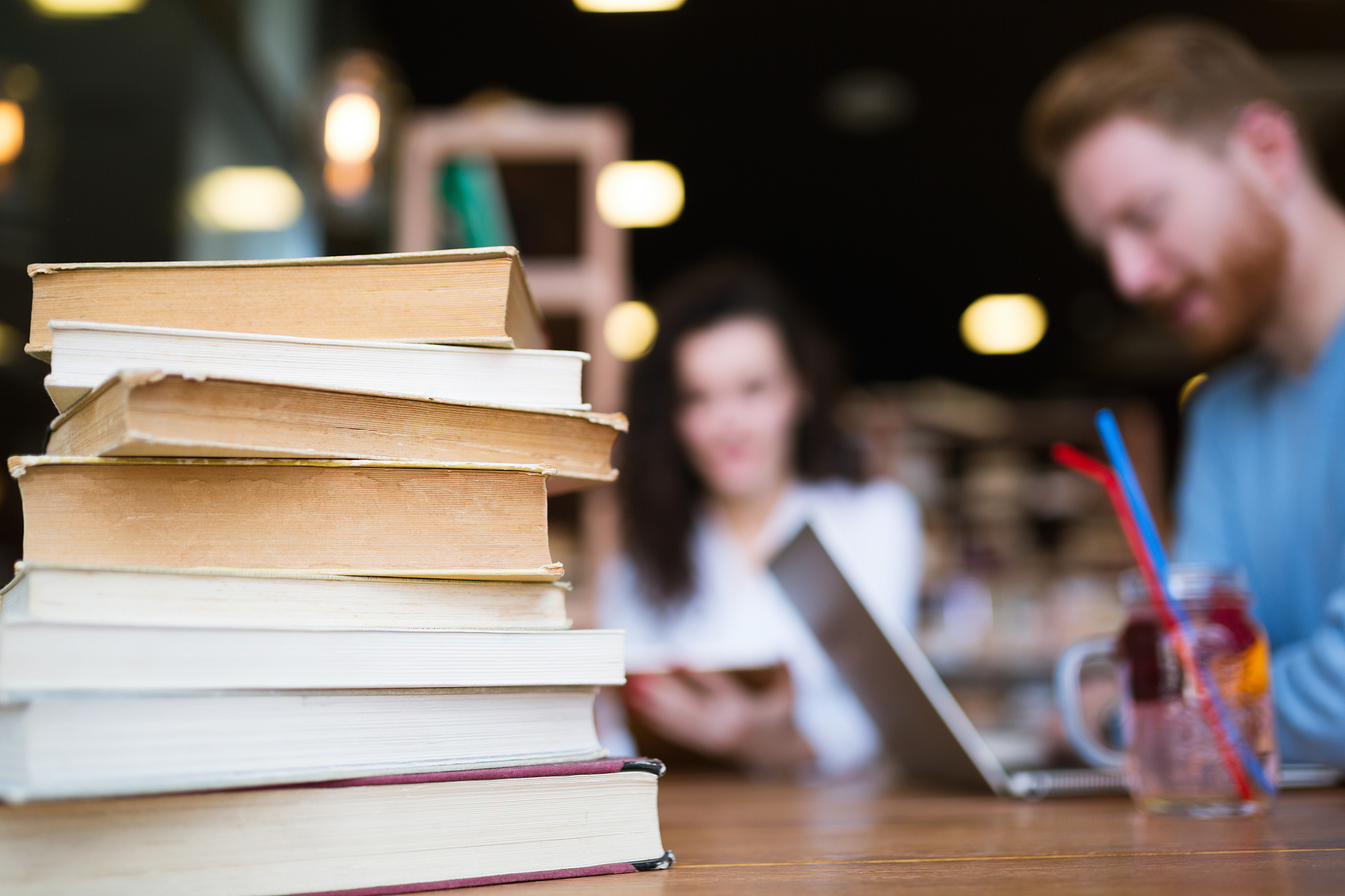 young students studying in library