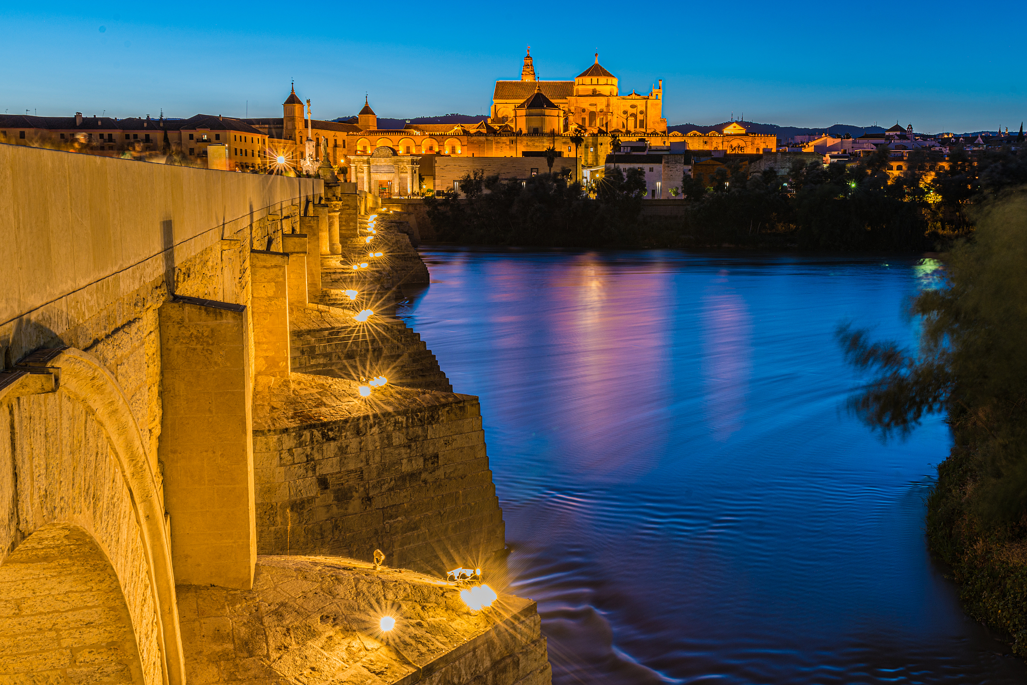 mosque-cathedral and roman bridge of cordoba, andalusia, spain