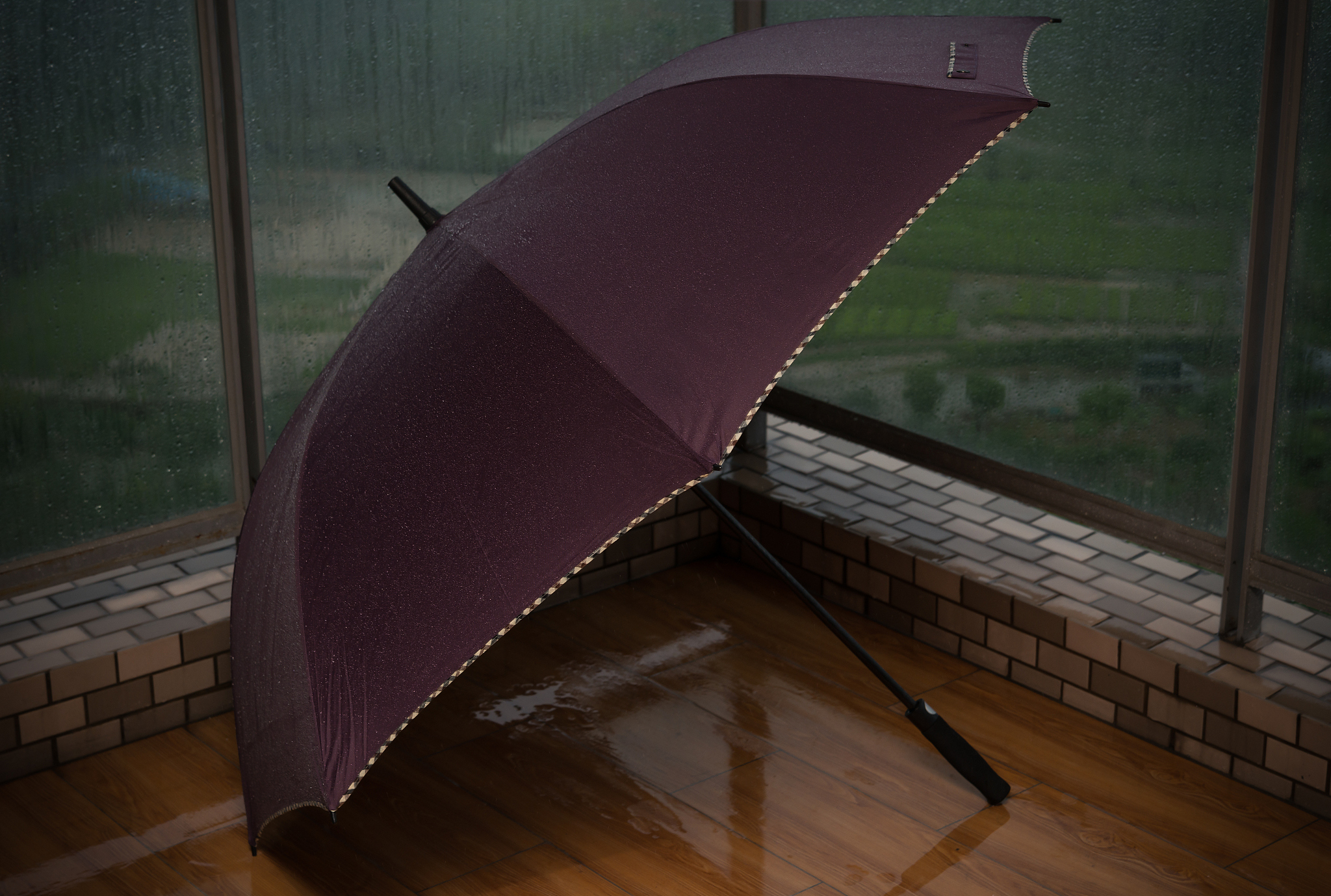 umbrella in balcony in a raining morning