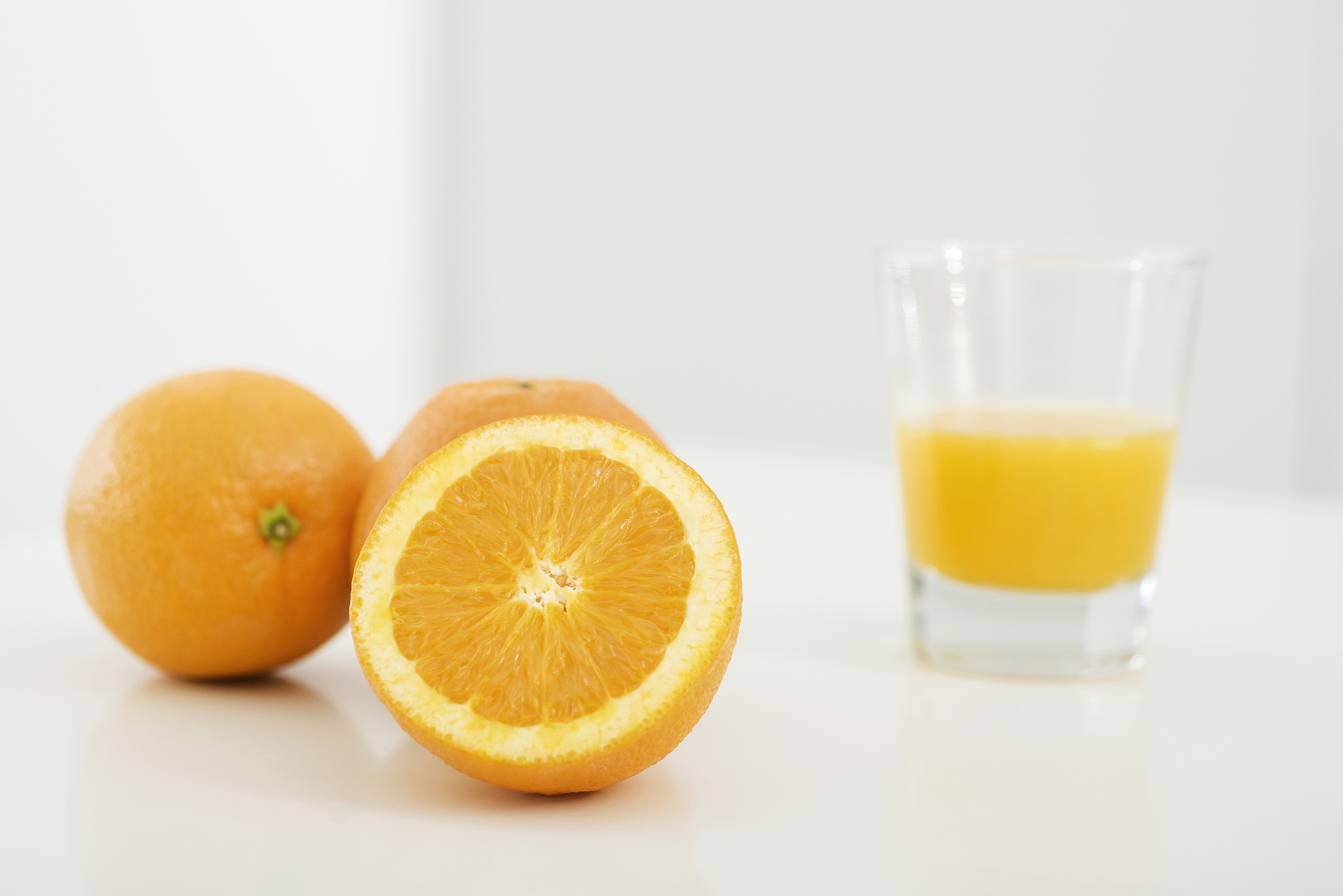 oranges and glass of orange juice