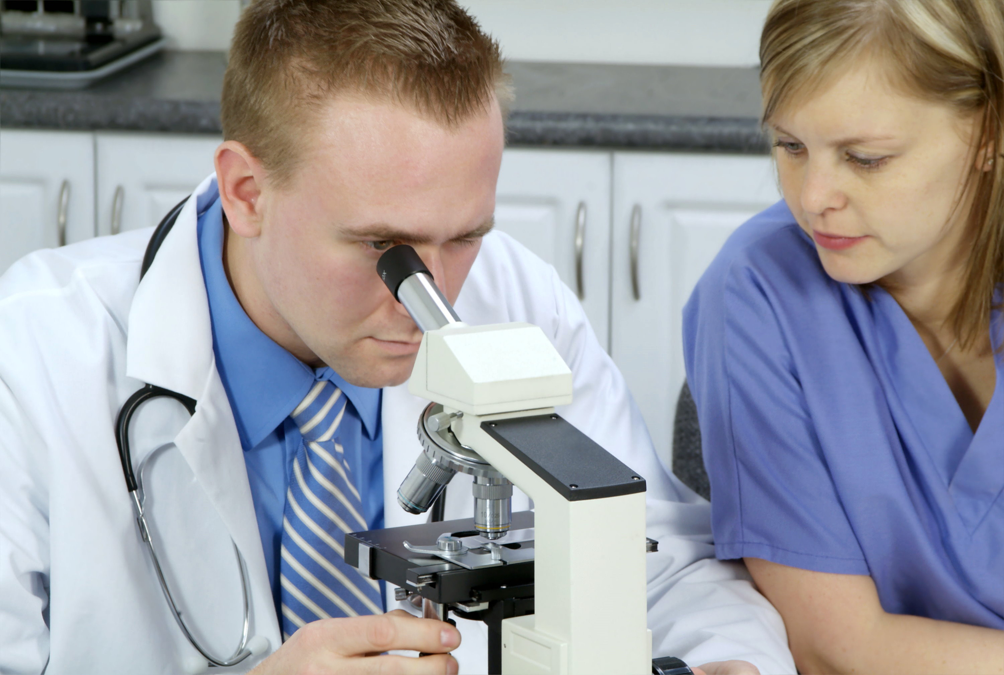doctors with microscope