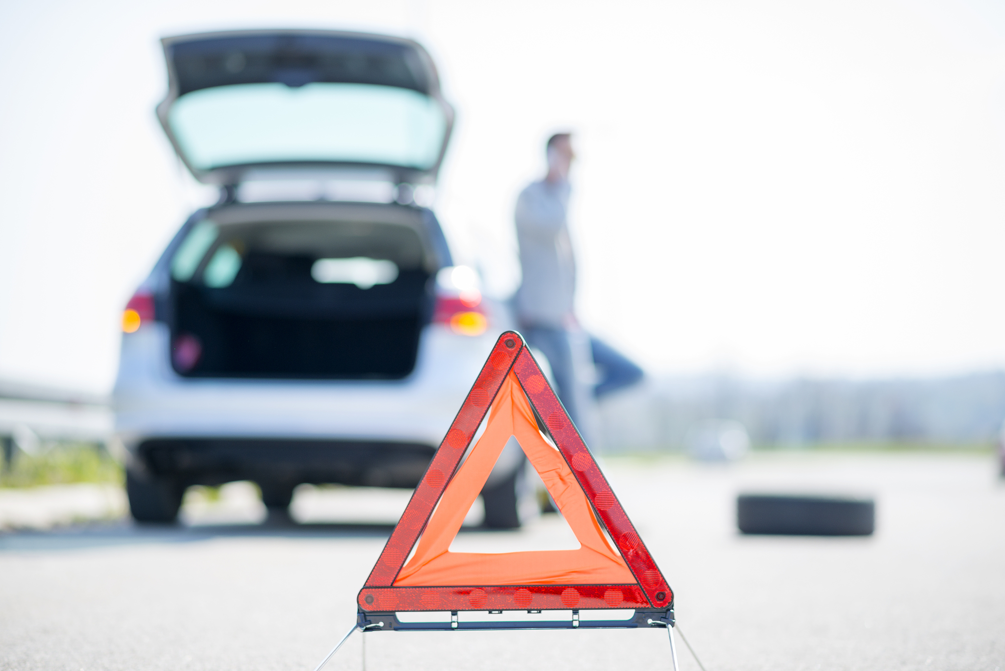car problems, red warning triangle!